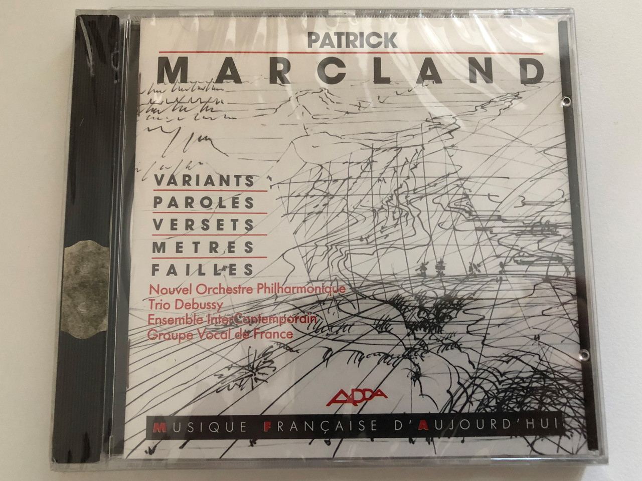 https://cdn10.bigcommerce.com/s-62bdpkt7pb/products/0/images/269154/Patrick_Marcland_Variants_Paroles_Verset_Metres_Failles_Nouvel_Orchestre_Philharmonique_Trio_Debussy_Ensemble_Intercontemporain_Groupe_Vocal_de_France_Adda_Audio_CD_1987_581067_1__78376.1678266889.1280.1280.JPG?c=2&_gl=1*1hkea5a*_ga*MjA2NTIxMjE2MC4xNTkwNTEyNTMy*_ga_WS2VZYPC6G*MTY3ODI2NjQ3MC43OTcuMS4xNjc4MjY2NTQwLjU3LjAuMA..