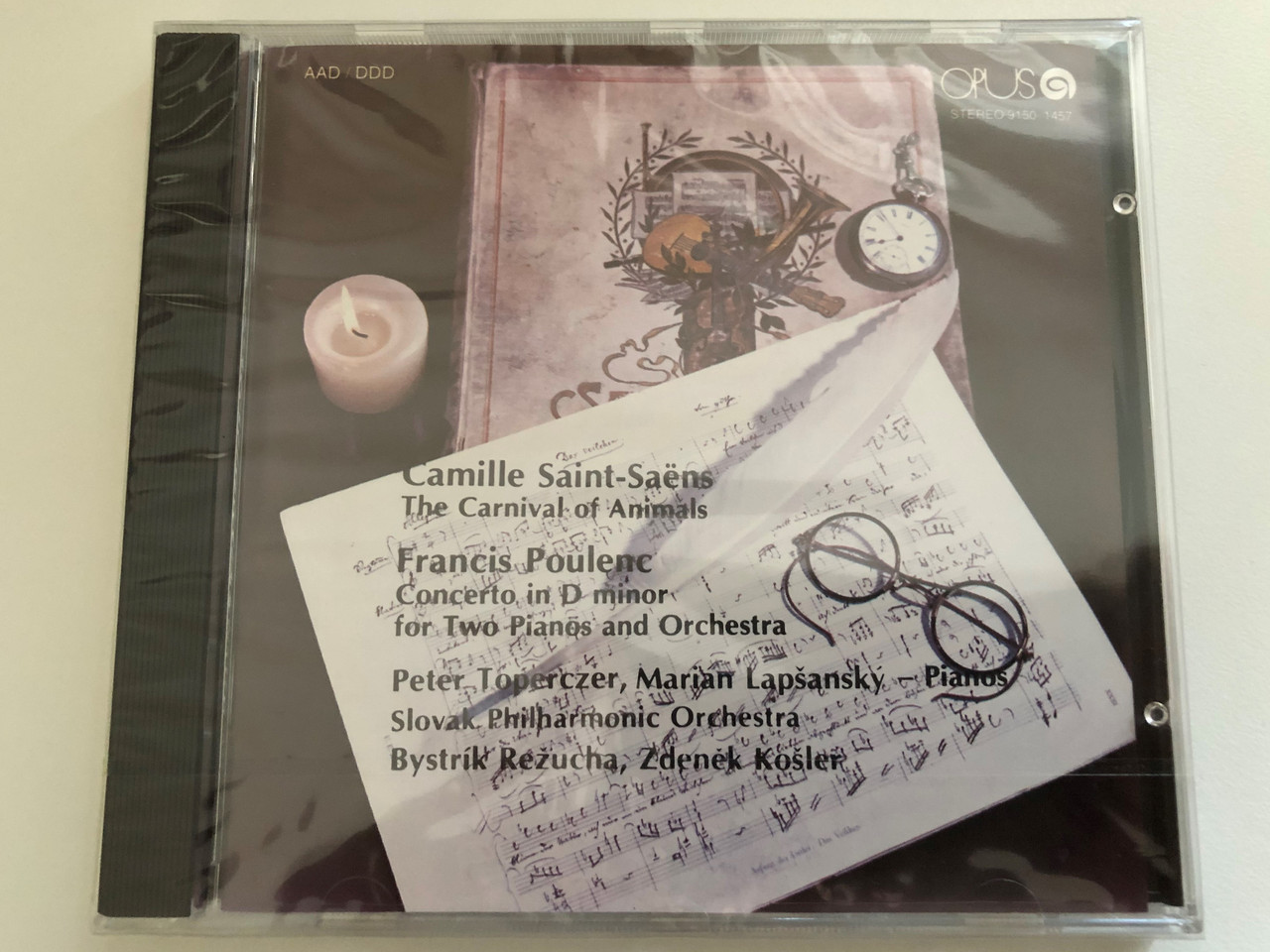 https://cdn10.bigcommerce.com/s-62bdpkt7pb/products/0/images/269161/Camille_Saint-Saens_The_Carnival_of_Animals_Francis_Poulenc_Concerto_In_D_minor_for_Two_Pianos_and_Orchestra_-_Peter_Toperczer_Marian_Lapansky_pianos_Slovak_Philharmonic_Orchestra_Byst_1__12341.1678267972.1280.1280.JPG?c=2&_gl=1*kvj4i4*_ga*MjA2NTIxMjE2MC4xNTkwNTEyNTMy*_ga_WS2VZYPC6G*MTY3ODI2NjQ3MC43OTcuMS4xNjc4MjY3NDIwLjM5LjAuMA..