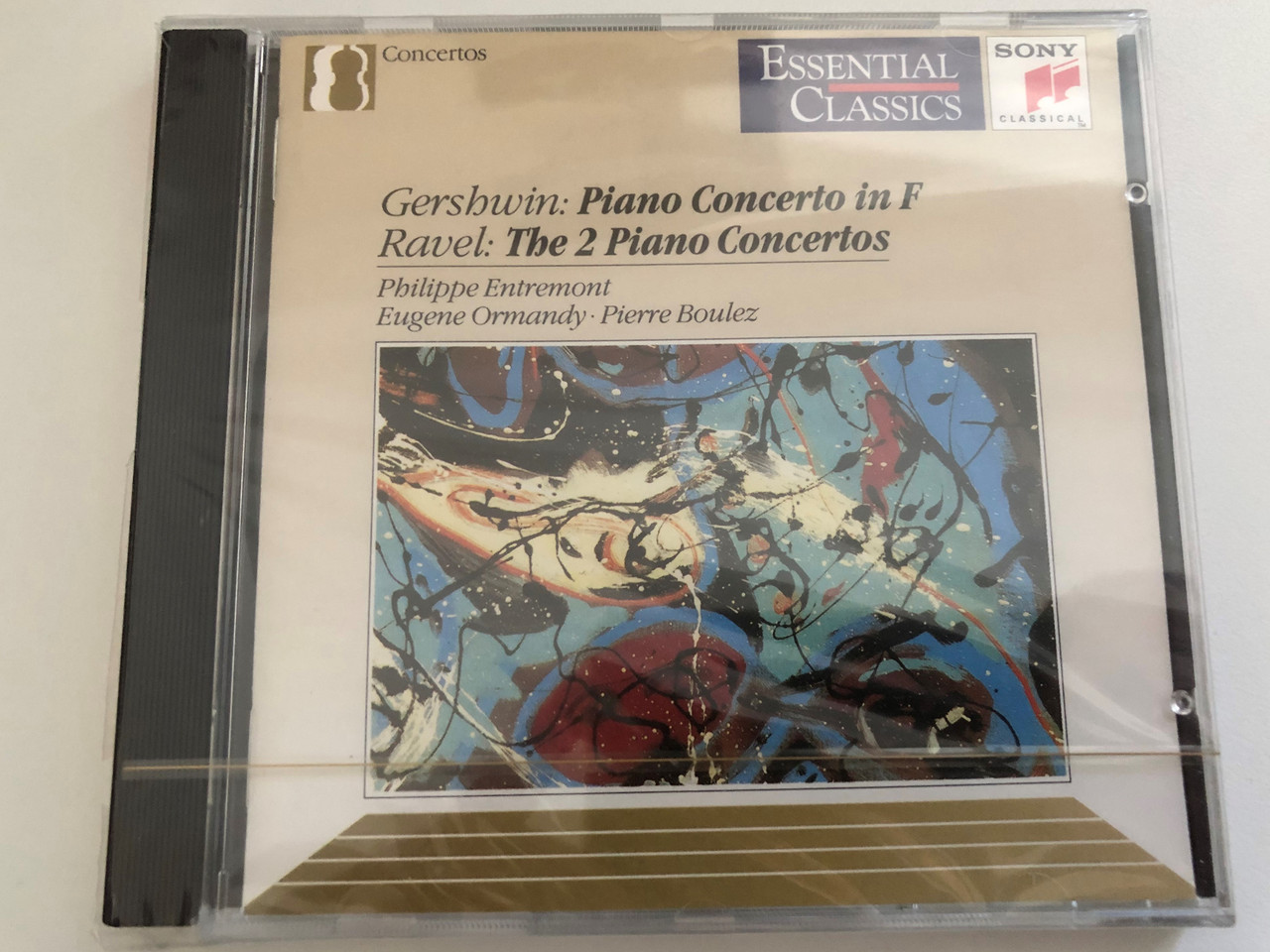 https://cdn10.bigcommerce.com/s-62bdpkt7pb/products/0/images/269187/Gershwin_Piano_Concerto_In_F_Ravel_The_2_Piano_Concertos_-_Philippe_Entremont_Eugene_Ormandy_Pierre_Boulez_Essential_Classics_Concertos_Sony_Classical_Audio_CD_1990_SBK_46338_1__05535.1678274828.1280.1280.JPG?c=2&_gl=1*1813bi5*_ga*MjA2NTIxMjE2MC4xNTkwNTEyNTMy*_ga_WS2VZYPC6G*MTY3ODI2NjQ3MC43OTcuMS4xNjc4Mjc0NTM4LjQzLjAuMA..