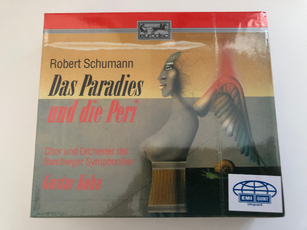 https://cdn10.bigcommerce.com/s-62bdpkt7pb/products/0/images/269272/Robert_Schumann_Das_Paradies_Und_Die_Peri_-_Chor_Und_Orchester_Der_Bamberger_Symphoniker_Gustav_Kuhn_Eurodisc_2x_Audio_CD_1991_Box_Set_RD_69105_1__02063.1678360587.1280.1280.JPG?c=2&_gl=1*9aq269*_ga*MjA2NTIxMjE2MC4xNTkwNTEyNTMy*_ga_WS2VZYPC6G*MTY3ODM0NjI5NS43OTguMS4xNjc4MzYwNDIyLjQ3LjAuMA..