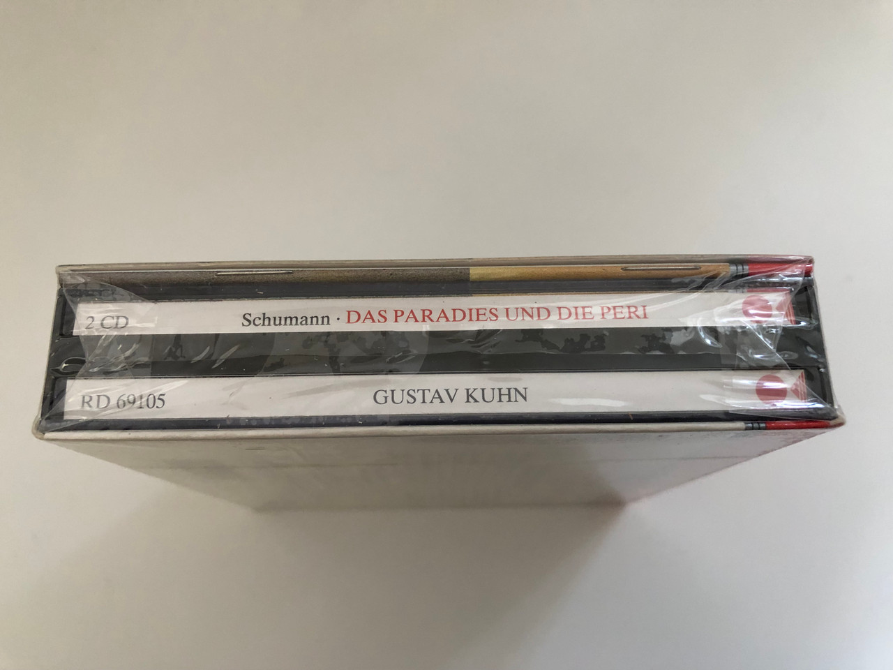 https://cdn10.bigcommerce.com/s-62bdpkt7pb/products/0/images/269273/Robert_Schumann_Das_Paradies_Und_Die_Peri_-_Chor_Und_Orchester_Der_Bamberger_Symphoniker_Gustav_Kuhn_Eurodisc_2x_Audio_CD_1991_Box_Set_RD_69105_5__03949.1678360587.1280.1280.JPG?c=2&_gl=1*9aq269*_ga*MjA2NTIxMjE2MC4xNTkwNTEyNTMy*_ga_WS2VZYPC6G*MTY3ODM0NjI5NS43OTguMS4xNjc4MzYwNDIyLjQ3LjAuMA..