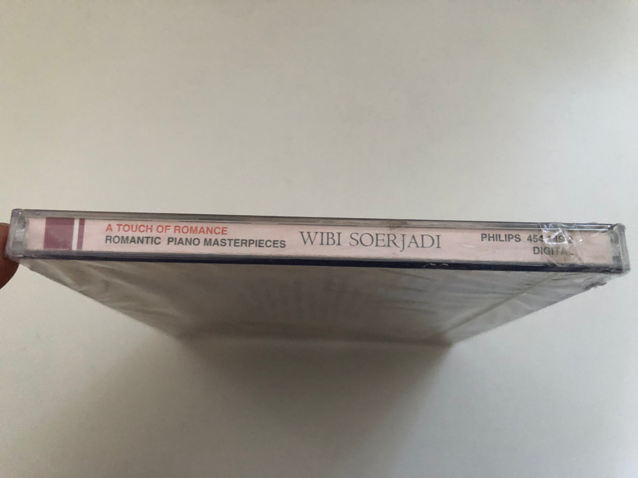 https://cdn10.bigcommerce.com/s-62bdpkt7pb/products/0/images/269336/Wibi_Soerjadi_A_Touch_Of_Romance_Romantic_Piano_Masterpieces_Philips_Audio_CD_1996_454_149-2_3__36941.1678438947.1280.1280.JPG?c=2&_gl=1*10bigce*_ga*MjA2NTIxMjE2MC4xNTkwNTEyNTMy*_ga_WS2VZYPC6G*MTY3ODQyOTUzMy44MDAuMS4xNjc4NDM4OTM1LjYwLjAuMA..