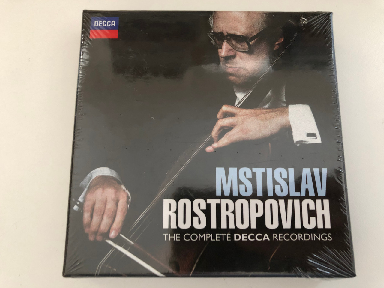https://cdn10.bigcommerce.com/s-62bdpkt7pb/products/0/images/269352/Mstislav_Rostropovich_The_Complete_Decca_Recordings_Decca_5x_Audio_CD_2012_478_3577_1__40554.1678443341.1280.1280.JPG?c=2&_gl=1*kuftkj*_ga*MjA2NTIxMjE2MC4xNTkwNTEyNTMy*_ga_WS2VZYPC6G*MTY3ODQyOTUzMy44MDAuMS4xNjc4NDQzMzQ2LjYwLjAuMA..