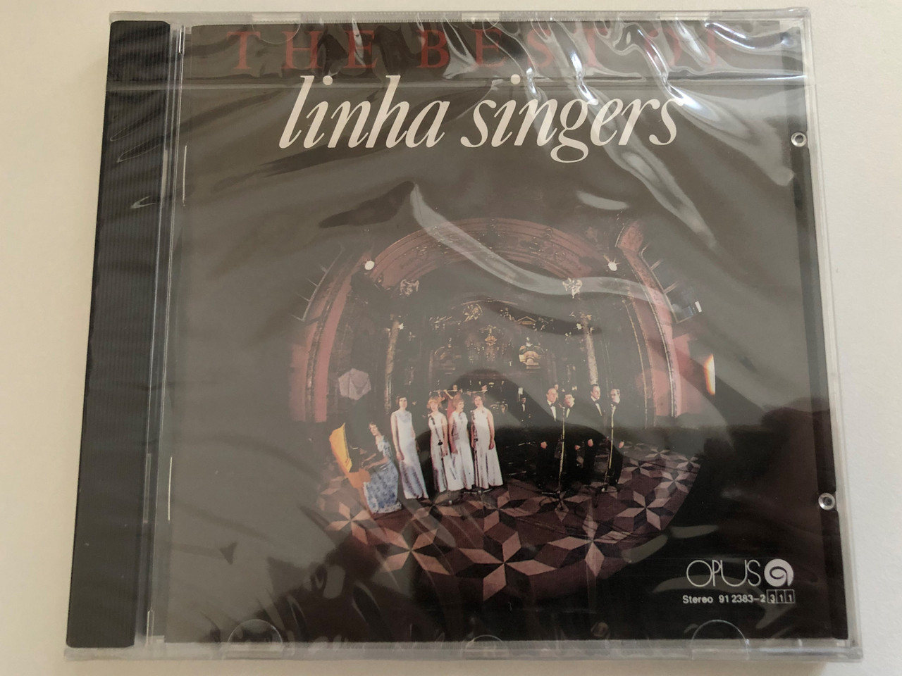 https://cdn10.bigcommerce.com/s-62bdpkt7pb/products/0/images/269383/The_Best_Of_Linha_Singers_Opus_Audio_CD_1995_Stereo_91_2383-2311_1__55813.1678720303.1280.1280.JPG?c=2&_gl=1*v5pw2v*_ga*MjA2NTIxMjE2MC4xNTkwNTEyNTMy*_ga_WS2VZYPC6G*MTY3ODcxMDQ2NC44MDEuMS4xNjc4NzIwMDc1LjIzLjAuMA..