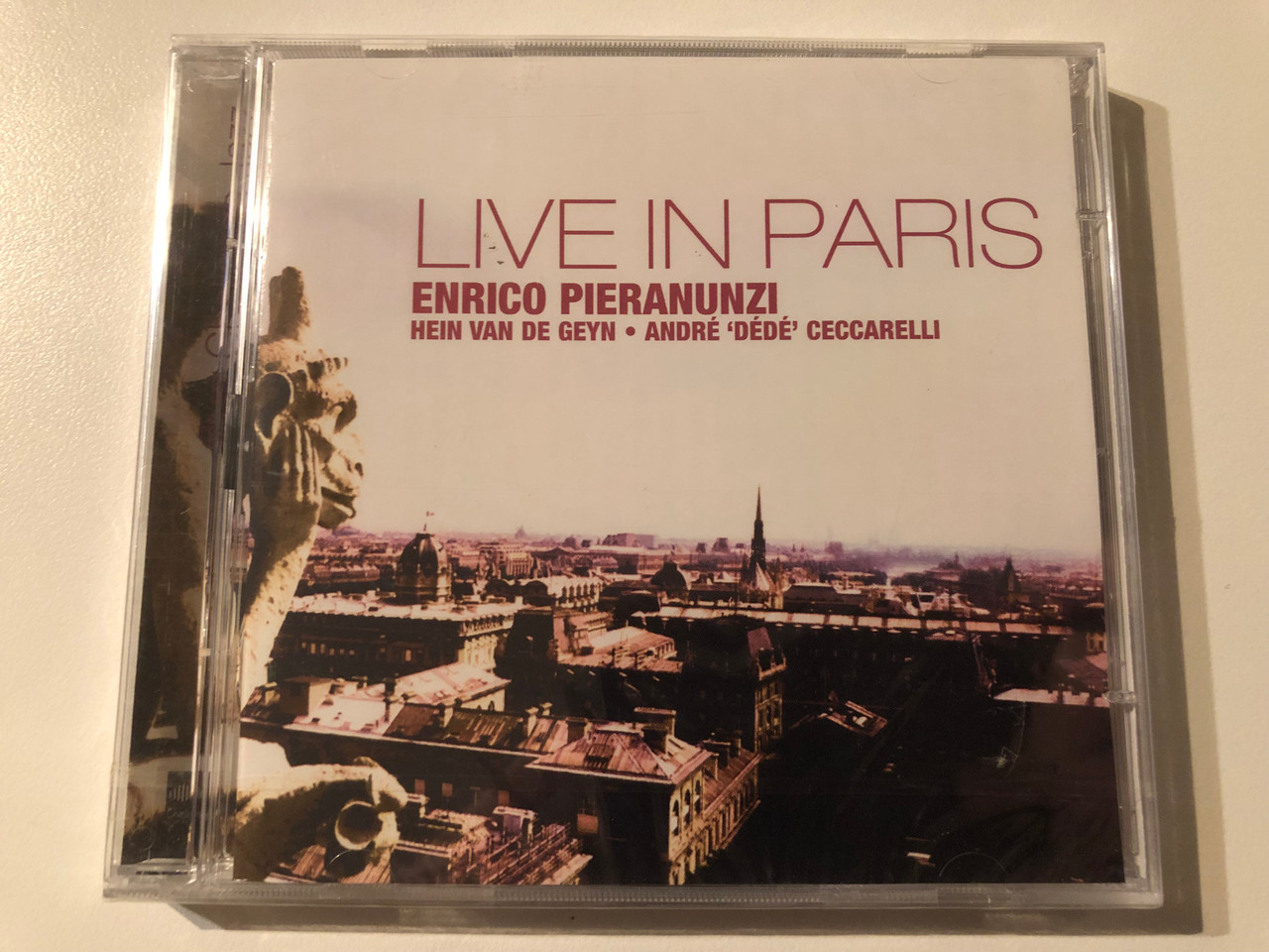https://cdn10.bigcommerce.com/s-62bdpkt7pb/products/0/images/269528/Enrico_Pieranunzi_Live_In_Paris_-_Hein_Van_de_Geyn_Andr_Dd_Ceccarelli_Challenge_Records_2x_Audio_CD_2005_CHR_70126_1__43559.1678820569.1280.1280.JPG?c=2&_gl=1*18vcctm*_ga*MjA2NTIxMjE2MC4xNTkwNTEyNTMy*_ga_WS2VZYPC6G*MTY3ODgwNjMzMy44MDMuMS4xNjc4ODIwNzYzLjYwLjAuMA..