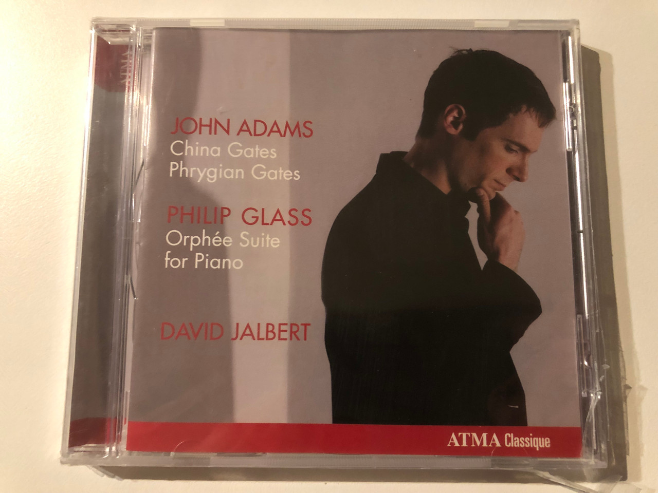 https://cdn10.bigcommerce.com/s-62bdpkt7pb/products/0/images/269571/John_Adams_China_Gates_Phrygian_Gates_Philip_Glass_Orphe_Suite_for_Piano_-_David_Jalbert_Atma_Classique_Audio_CD_2010_ACD2_2556_1__58020.1678890164.1280.1280.JPG?c=2&_gl=1*1hffpza*_ga*MjA2NTIxMjE2MC4xNTkwNTEyNTMy*_ga_WS2VZYPC6G*MTY3ODg4ODA1NC44MDUuMS4xNjc4ODkwMDMzLjUxLjAuMA..