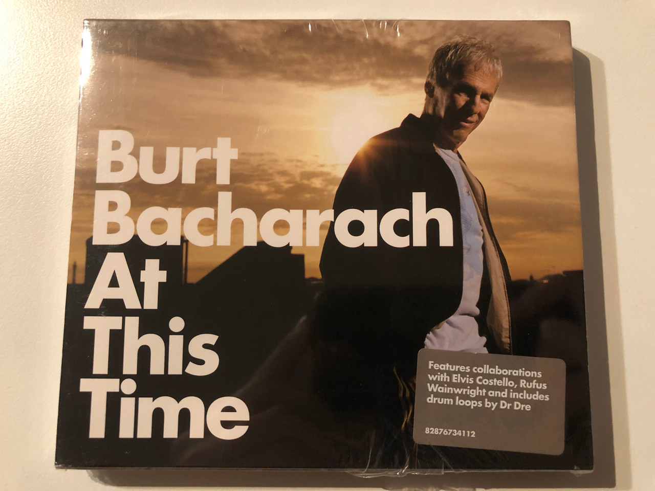https://cdn10.bigcommerce.com/s-62bdpkt7pb/products/0/images/269607/Burt_Bacharach_At_This_Time_Features_collaborations_with_Elvis_Costello_Rufus_Wainwright_and_includes_drum_loops_by_Dr_Dre_Sony_BMG_Music_Entertainment_Audio_CD_2005_82876734112_1__23941.1678906566.1280.1280.JPG?c=2&_gl=1*3m5416*_ga*MjA2NTIxMjE2MC4xNTkwNTEyNTMy*_ga_WS2VZYPC6G*MTY3ODkwMDQ1NC44MDYuMS4xNjc4OTA2MjI4LjE4LjAuMA..