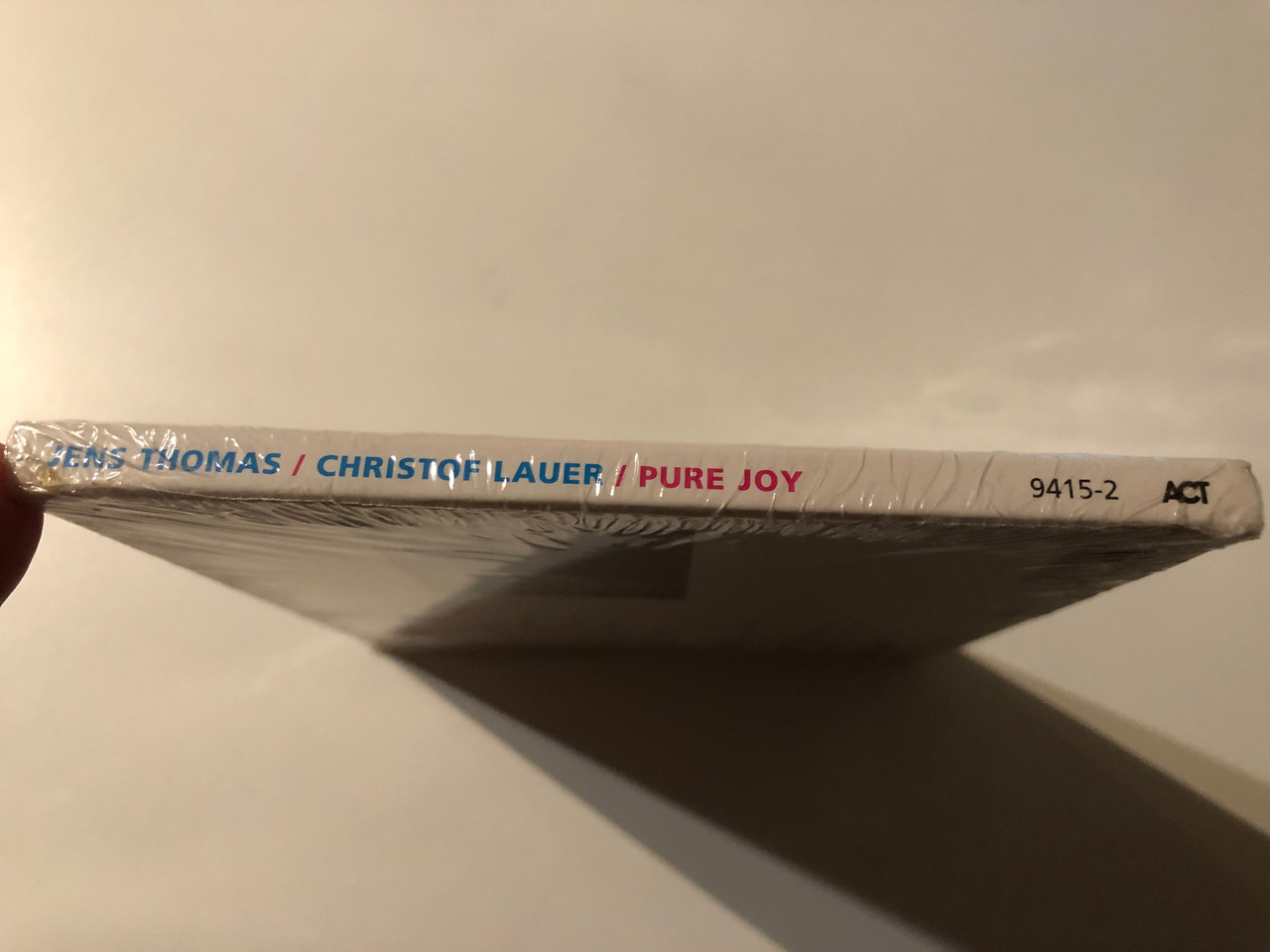 https://cdn10.bigcommerce.com/s-62bdpkt7pb/products/0/images/269612/Jens_Thomas_Christof_Lauer_Pure_Joy_ACT_Audio_CD_2003_ACT_9415-2_3__34219.1678907077.1280.1280.JPG?c=2&_gl=1*6tppq6*_ga*MjA2NTIxMjE2MC4xNTkwNTEyNTMy*_ga_WS2VZYPC6G*MTY3ODkwMDQ1NC44MDYuMS4xNjc4OTA3MDU4LjYwLjAuMA..