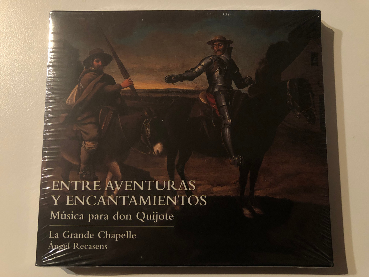https://cdn10.bigcommerce.com/s-62bdpkt7pb/products/0/images/269616/Entre_Aventuras_Y_Encantamientos_Msica_Para_Don_Quijote_-_La_Grande_Chapelle_ngel_Recasens_Lauda_Audio_CD_2005_LAU001_1__44143.1678907712.1280.1280.JPG?c=2&_gl=1*1b7wktp*_ga*MjA2NTIxMjE2MC4xNTkwNTEyNTMy*_ga_WS2VZYPC6G*MTY3ODkwMDQ1NC44MDYuMS4xNjc4OTA3NjA5LjQ0LjAuMA..