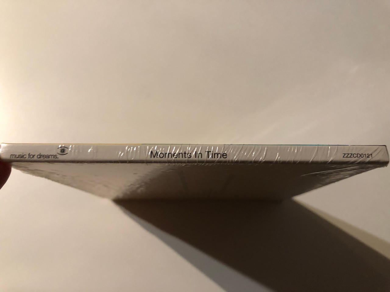 https://cdn10.bigcommerce.com/s-62bdpkt7pb/products/0/images/269621/Moments_In_Time_-_Complied_By_Moonboots_This_Compilation_Is_The_Second_Album_In_A_New_Exclusive_Collector_Series_On_Music_For_Dreams_Music_For_Dreams_Audio_CD_ZZZCD0121_3__01002.1678908030.1280.1280.JPG?c=2&_gl=1*69c4qa*_ga*MjA2NTIxMjE2MC4xNTkwNTEyNTMy*_ga_WS2VZYPC6G*MTY3ODkwMDQ1NC44MDYuMS4xNjc4OTA3ODU2LjQ0LjAuMA..
