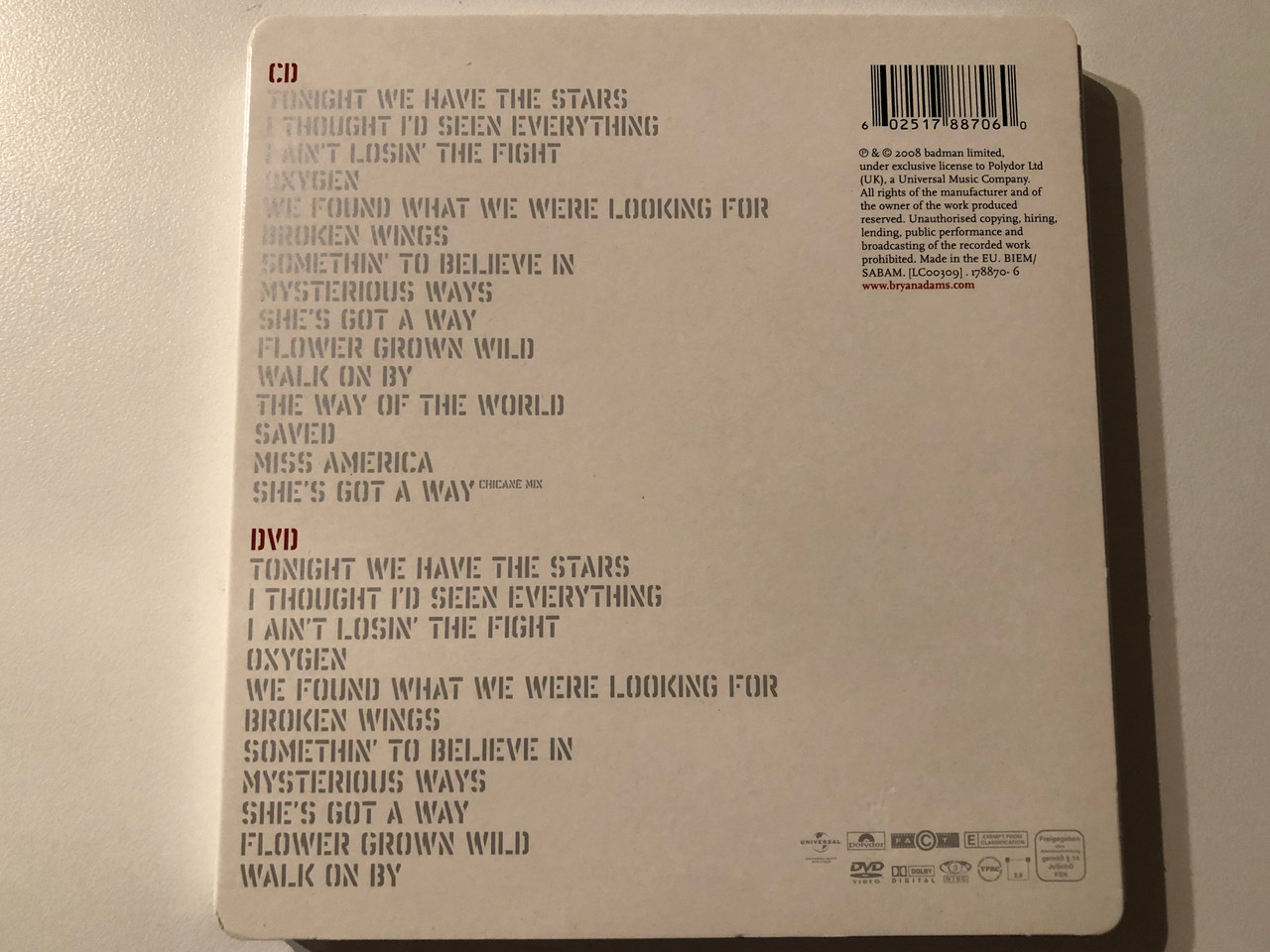 https://cdn10.bigcommerce.com/s-62bdpkt7pb/products/0/images/269728/Bryan_Adams_11_Polydor_Audio_CD_DVD_Video_CD_2008_178870-6_2__17721.1679066419.1280.1280.JPG?c=2&_gl=1*jxlb5i*_ga*MjA2NTIxMjE2MC4xNTkwNTEyNTMy*_ga_WS2VZYPC6G*MTY3OTA2NTc5Mi44MTEuMS4xNjc5MDY2ODIxLjYwLjAuMA..