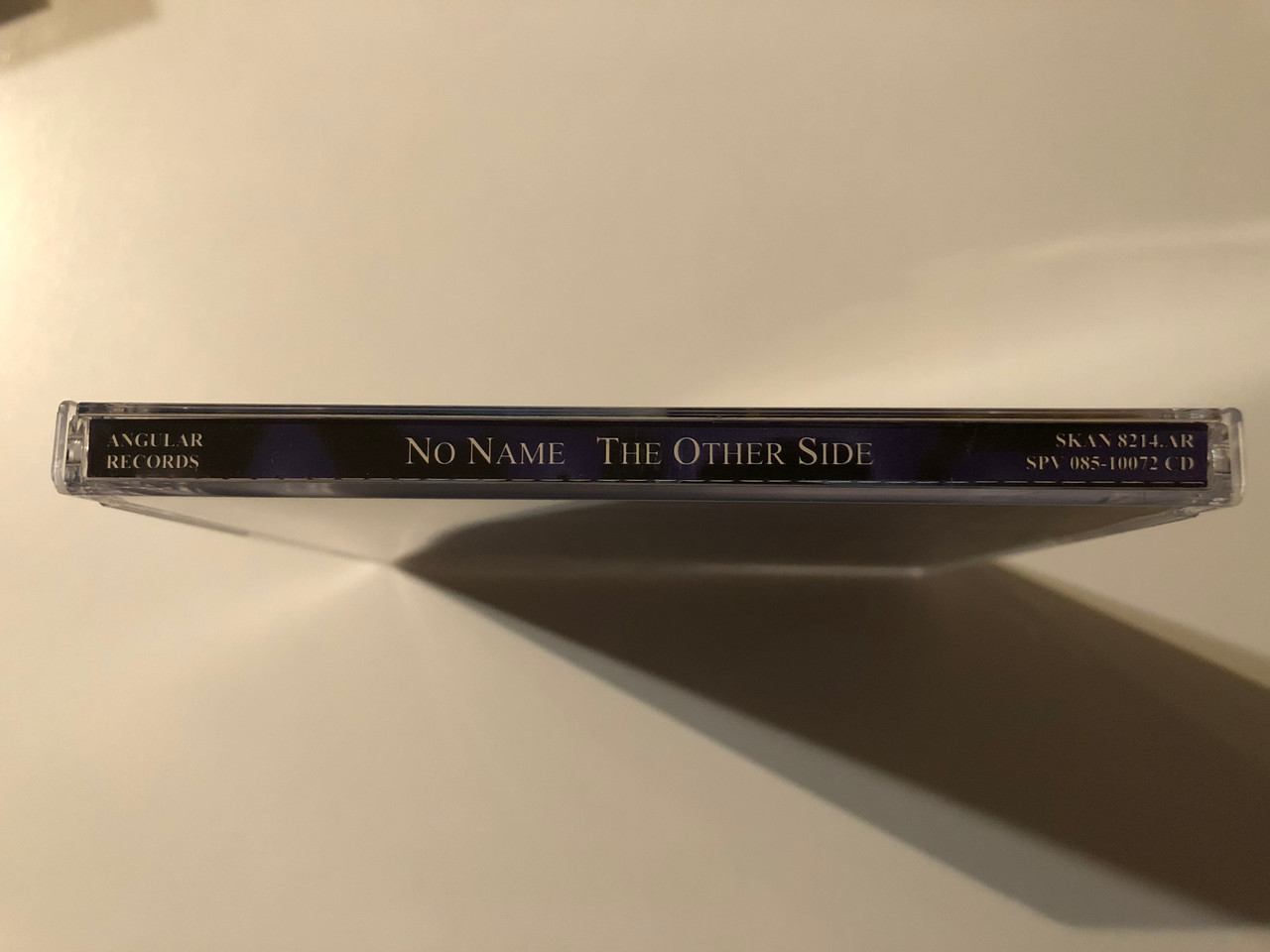 https://cdn10.bigcommerce.com/s-62bdpkt7pb/products/0/images/269745/No_Name_-_The_Other_Side_Angular_Records_Audio_CD_1998_SKAN_8214_3__21502.1679071335.1280.1280.JPG?c=2&_gl=1*12avq1s*_ga*MjA2NTIxMjE2MC4xNTkwNTEyNTMy*_ga_WS2VZYPC6G*MTY3OTA2NTc5Mi44MTEuMS4xNjc5MDcwOTU3LjYwLjAuMA..