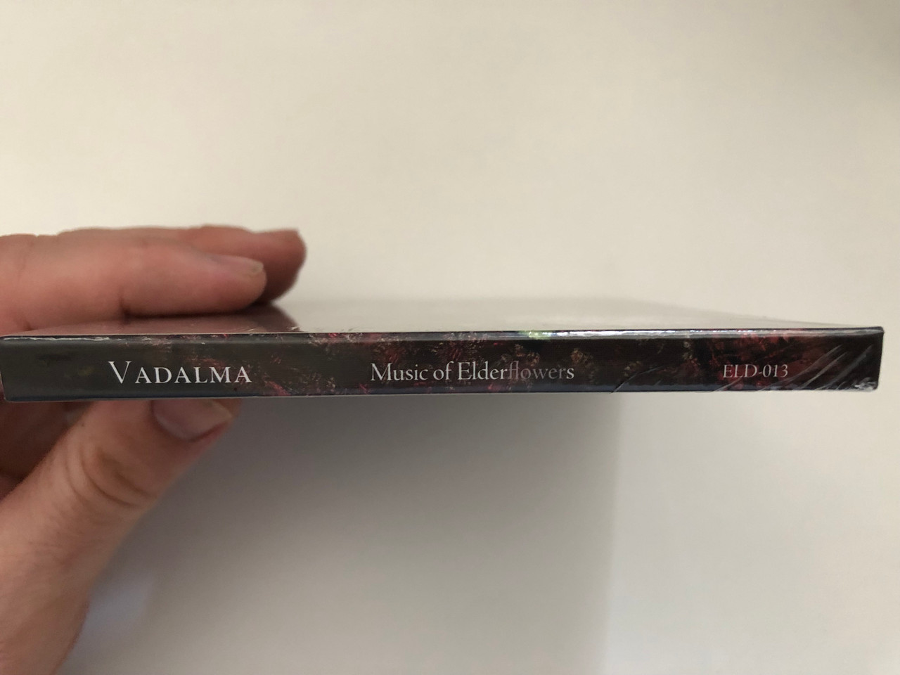 https://cdn10.bigcommerce.com/s-62bdpkt7pb/products/0/images/269763/Zina_Bozzay_Vadalma_-_Music_of_Elderflowers_Hungarian_village_folk_songs_in_handmade_arrangements_Elder_Records_Audio_CD_2018_ELD-013_3__14157.1679074217.1280.1280.JPG?c=2&_gl=1*1vobo6i*_ga*MjA2NTIxMjE2MC4xNTkwNTEyNTMy*_ga_WS2VZYPC6G*MTY3OTA2NTc5Mi44MTEuMS4xNjc5MDczNjQwLjQ0LjAuMA..