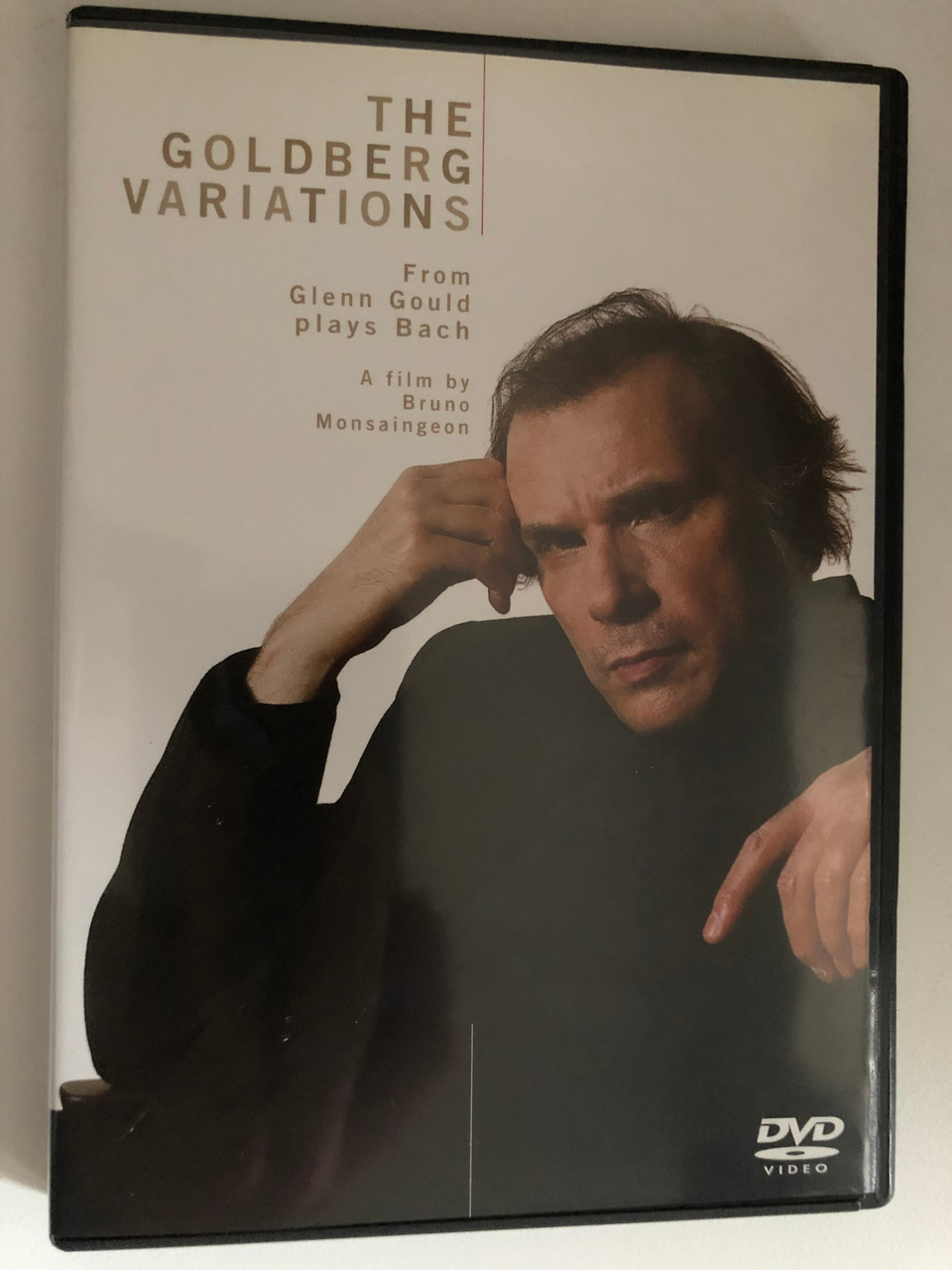 https://cdn10.bigcommerce.com/s-62bdpkt7pb/products/0/images/269767/The_Goldberg_Variations_-_From_Glenn_Gould_playd_Bach_A_Film_by_Bruno_Monsaingeon_Sony_Classical_DVD_Video_CD_2000_SVD_48424_1__53687.1679075403.1280.1280.JPG?c=2&_gl=1*1q6gp5z*_ga*MjA2NTIxMjE2MC4xNTkwNTEyNTMy*_ga_WS2VZYPC6G*MTY3OTA2NTc5Mi44MTEuMS4xNjc5MDc1MDczLjQ2LjAuMA..