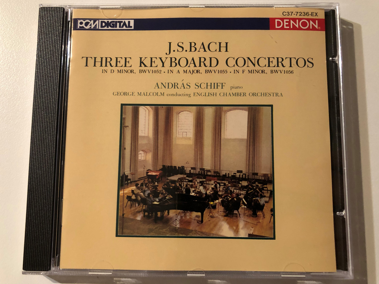 https://cdn10.bigcommerce.com/s-62bdpkt7pb/products/0/images/269882/J.S._Bach_Three_Keyboard_Concertos_In_D_Minor_BWV1052_In_A_Major_BWV1055_In_F_Minor_BWV1056_-_Andrs_Schiff_piano_George_Malcolm_Conducting_English_Chamber_Orchestra_Denon_Audio_CD_1__33394.1679297485.1280.1280.JPG?c=2&_gl=1*1cc86s7*_ga*MjA2NTIxMjE2MC4xNTkwNTEyNTMy*_ga_WS2VZYPC6G*MTY3OTI5NDk1OC44MTIuMS4xNjc5Mjk3MTU2LjU0LjAuMA..