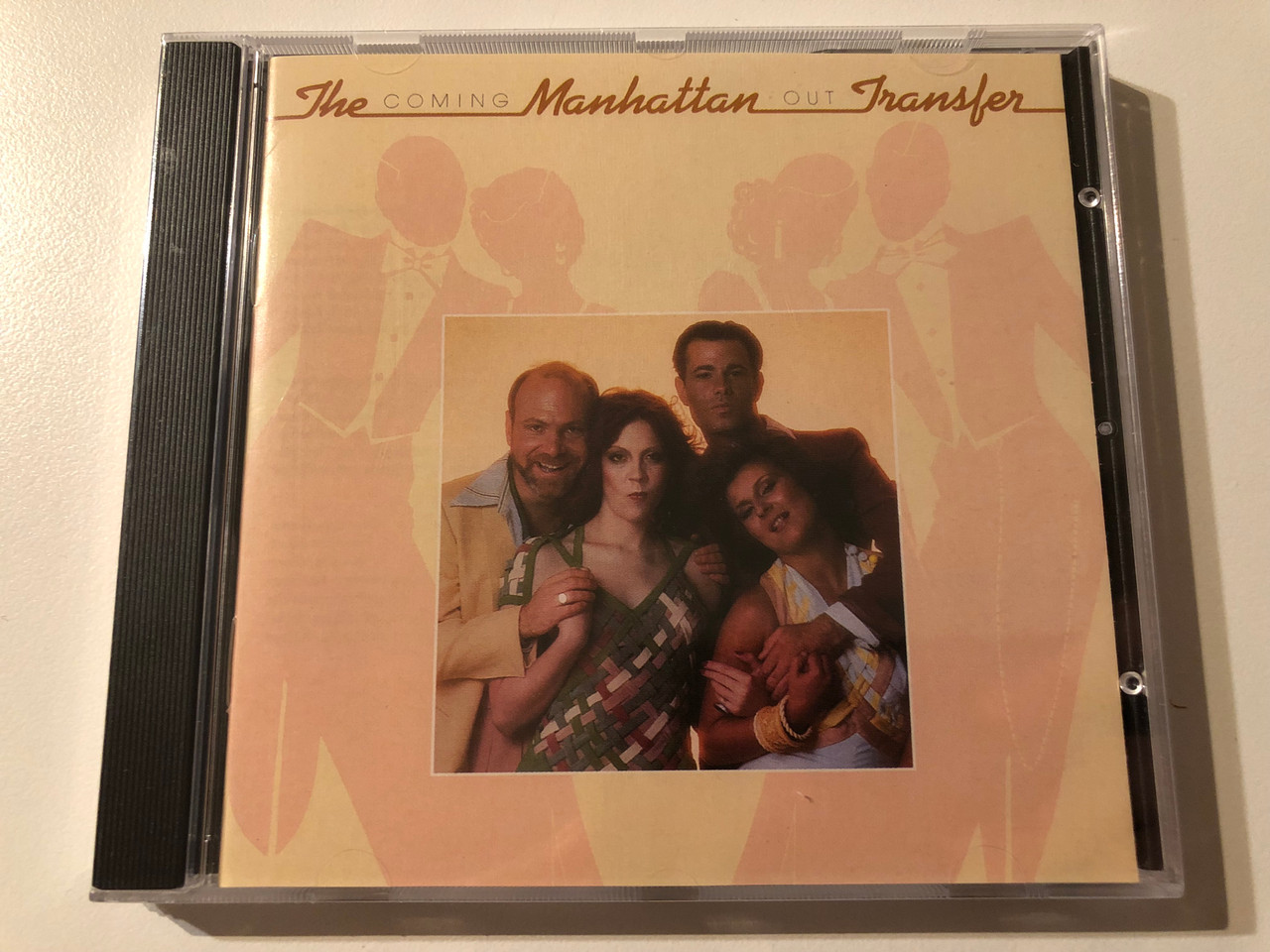 https://cdn10.bigcommerce.com/s-62bdpkt7pb/products/0/images/270458/The_Manhattan_Transfer_Coming_Out_Atlantic_Audio_CD_18183-2_1__90157.1679639189.1280.1280.JPG?c=2&_gl=1*x12z6m*_ga*MjA2NTIxMjE2MC4xNTkwNTEyNTMy*_ga_WS2VZYPC6G*MTY3OTYzODIwNi44MjAuMS4xNjc5NjM5MDYzLjQ1LjAuMA..