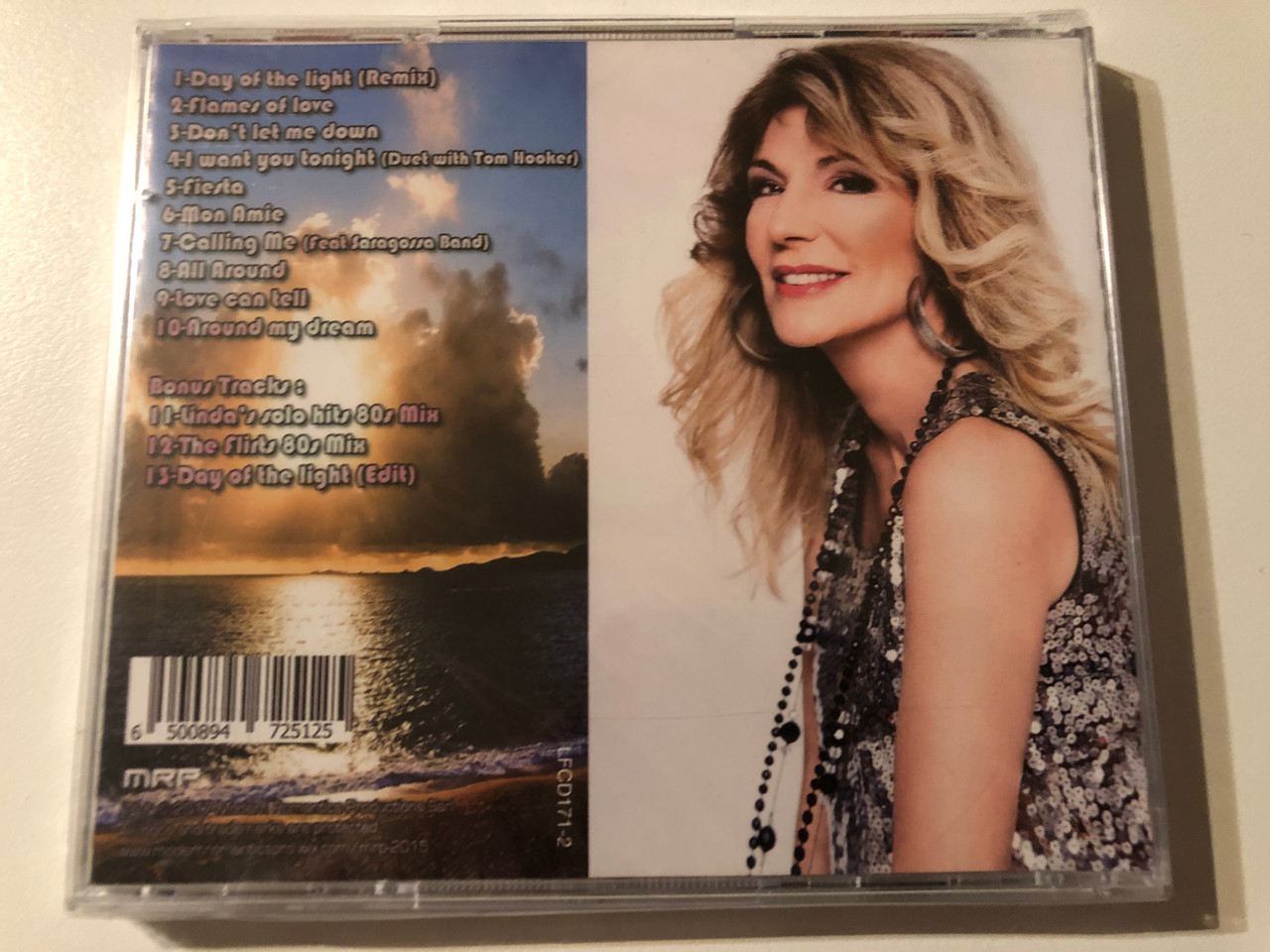 https://cdn10.bigcommerce.com/s-62bdpkt7pb/products/0/images/270485/Linda_Jo_Rizzo_Day_Of_The_Light_80s_Reloaded_incl._duet_with_Tom_Hooker_I_Want_You_Tonight_Modern_Romantics_Productions_Audio_CD_LFCD171-2_2__55537.1679644404.1280.1280.JPG?c=2&_gl=1*1yoyhct*_ga*MjA2NTIxMjE2MC4xNTkwNTEyNTMy*_ga_WS2VZYPC6G*MTY3OTYzODIwNi44MjAuMS4xNjc5NjQzNDgzLjU1LjAuMA..