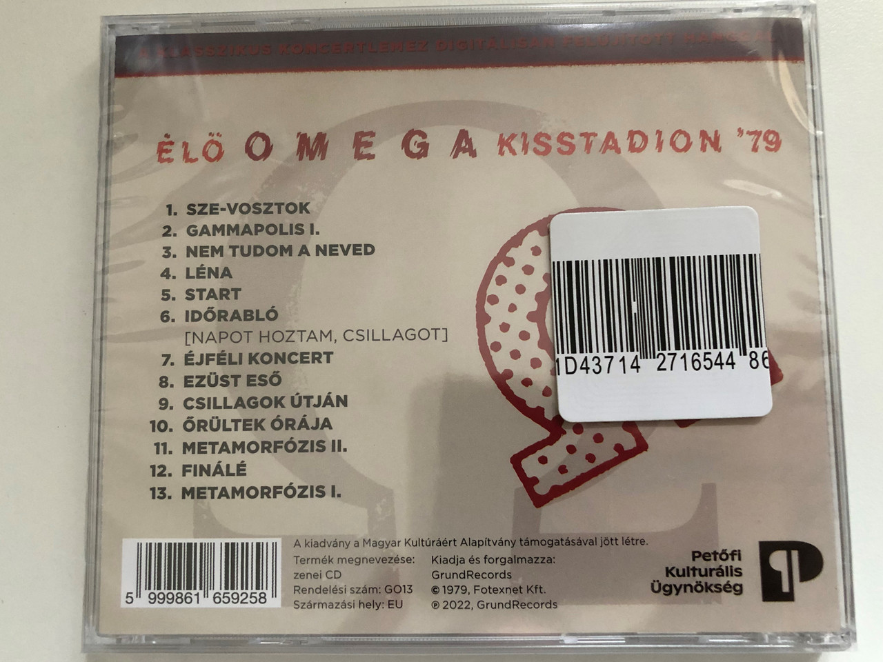 https://cdn10.bigcommerce.com/s-62bdpkt7pb/products/0/images/270860/l_Omega_Kisstadion_79_GrundRecords_Audio_CD_2022_GO13_2__64448.1679942503.1280.1280.JPG?c=2&_gl=1*1vgaa70*_ga*MjA2NTIxMjE2MC4xNTkwNTEyNTMy*_ga_WS2VZYPC6G*MTY3OTkzNzAzOC44MjMuMS4xNjc5OTQyMzc1LjQ0LjAuMA..