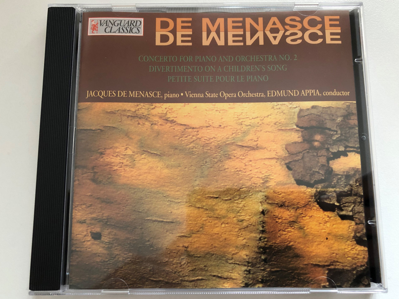 https://cdn10.bigcommerce.com/s-62bdpkt7pb/products/0/images/271068/Concerto_for_piano_and_orchestra_No._2_Divertimento_On_A_Childrens_Song_Petite_suite_pour_le_piano_-_Jacques_de_Menasce_piano_Vienna_State_Opera_Orchestra_Edmond_Appia_conductor_Va_1__43726.1680019239.1280.1280.JPG?c=2&_gl=1*6e8hm3*_ga*MjA2NTIxMjE2MC4xNTkwNTEyNTMy*_ga_WS2VZYPC6G*MTY4MDAwODU4Mi44MjQuMS4xNjgwMDE4NTk5LjM2LjAuMA..