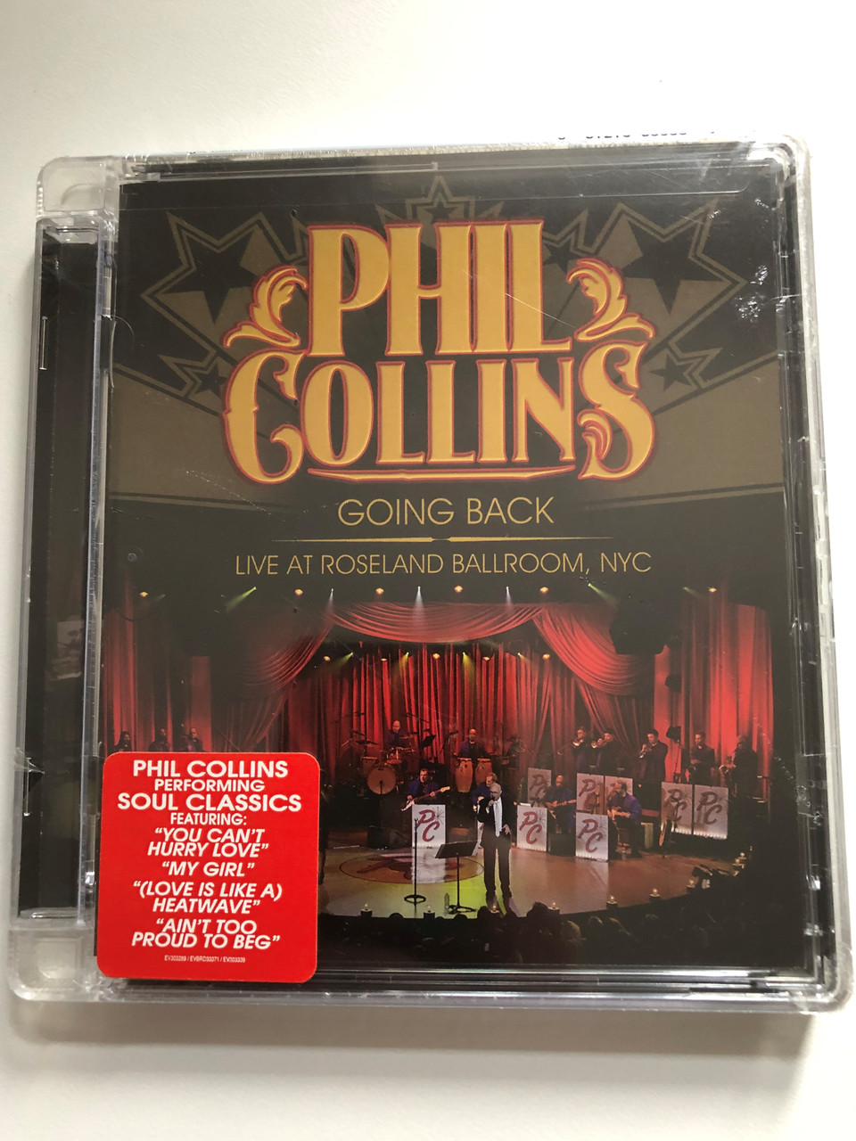 https://cdn10.bigcommerce.com/s-62bdpkt7pb/products/0/images/271153/Phil_Collins_Going_Back_Live_At_Roseland_Ballroom_NYC_Phil_Collins_Performing_Soul_Classics_Featuring_You_Cant_Hurry_Love_My_Girl_Love_Is_Like_A_Heatwave_Aint_Too_P_1__53157.1680026736.1280.1280.JPG?c=2&_gl=1*kbnj52*_ga*MjA2NTIxMjE2MC4xNTkwNTEyNTMy*_ga_WS2VZYPC6G*MTY4MDAwODU4Mi44MjQuMS4xNjgwMDI2NjQ3LjQ0LjAuMA..