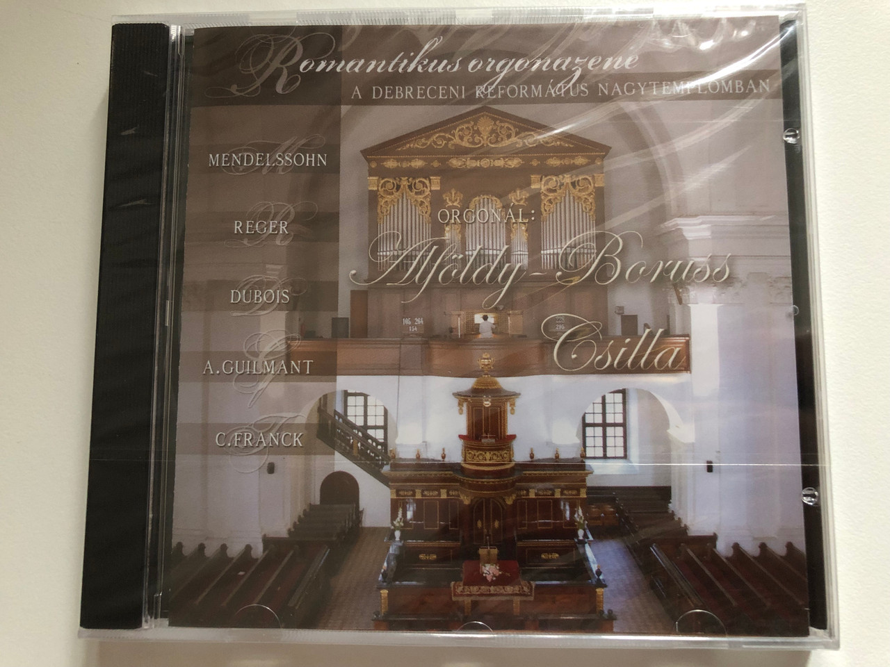 https://cdn10.bigcommerce.com/s-62bdpkt7pb/products/0/images/271328/Romantikus_Orgonazene_A_Debreceni_Reformtus_Nagytemplomban_-_Orgonal_Alfldy-Boruss_Csilla_Mendelssohn_Reger_Dubois_A._Guilmant_G._Franck_Audio_CD_2006_AB_2006_1__24726.1680107097.1280.1280.JPG?c=2&_gl=1*pbr7qw*_ga*MjA2NTIxMjE2MC4xNTkwNTEyNTMy*_ga_WS2VZYPC6G*MTY4MDA5NDQwMi44MjUuMS4xNjgwMTA2Nzk2LjQzLjAuMA..