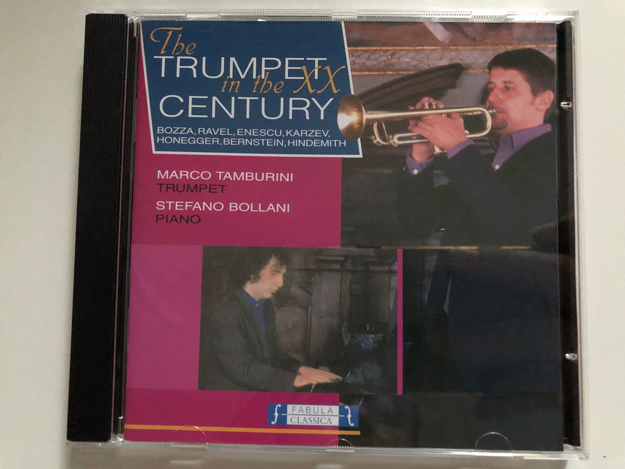https://cdn10.bigcommerce.com/s-62bdpkt7pb/products/0/images/271699/The_Trumpet_in_the_XX_Century_-_Bozza_Ravel_Enescu_Karzev_Honegger_Bernstein_Hindemith_-_Marco_Tamburini_trumpet_Stefano_Bollani_piano_Fabula_Classica_Audio_CD_2001_FAB_29906-2_1__06913.1680284262.1280.1280.JPG?c=2&_gl=1*1ijgs60*_ga*MjA2NTIxMjE2MC4xNTkwNTEyNTMy*_ga_WS2VZYPC6G*MTY4MDI3MDcyNS44MjguMS4xNjgwMjg0MjQ2LjYwLjAuMA..