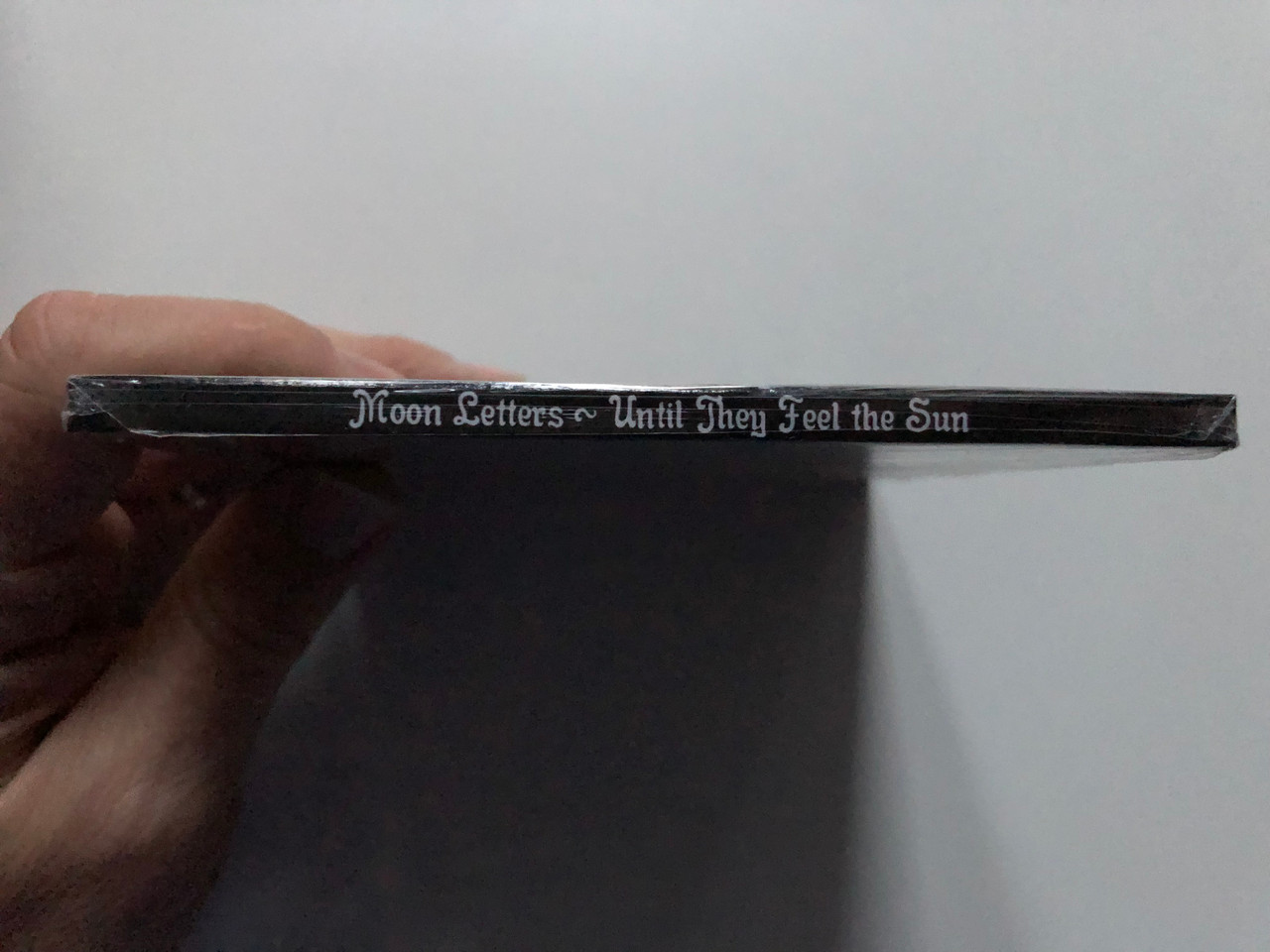 https://cdn10.bigcommerce.com/s-62bdpkt7pb/products/0/images/272389/Moon_Letters_Until_They_Feel_The_Sun_Audio_CD_3__00334.1681236478.1280.1280.JPG?c=2&_gl=1*1litpi6*_ga*MjA2NTIxMjE2MC4xNTkwNTEyNTMy*_ga_WS2VZYPC6G*MTY4MTIzMTIyMC44NDQuMS4xNjgxMjM2NDYyLjYwLjAuMA..