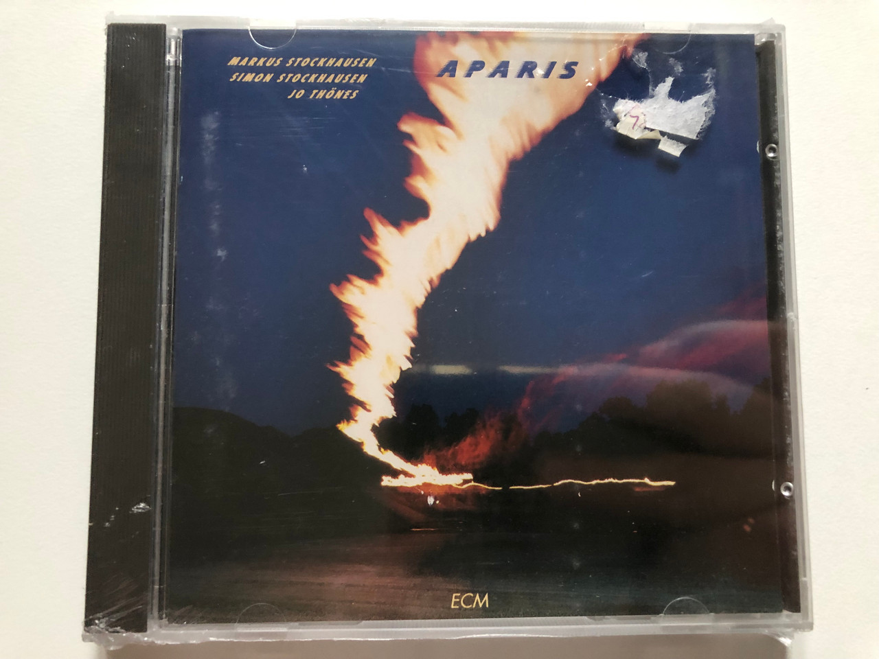 https://cdn10.bigcommerce.com/s-62bdpkt7pb/products/0/images/272580/Markus_Stockhausen_Simon_Stockhausen_Jo_Thnes_Aparis_ECM_Records_Audio_CD_1990_ECM_1404_1__94702.1681323120.1280.1280.JPG?c=2&_gl=1*1qw7nnw*_ga*MjA2NTIxMjE2MC4xNTkwNTEyNTMy*_ga_WS2VZYPC6G*MTY4MTMwODY2NS44NDUuMS4xNjgxMzIzMDMzLjUyLjAuMA..