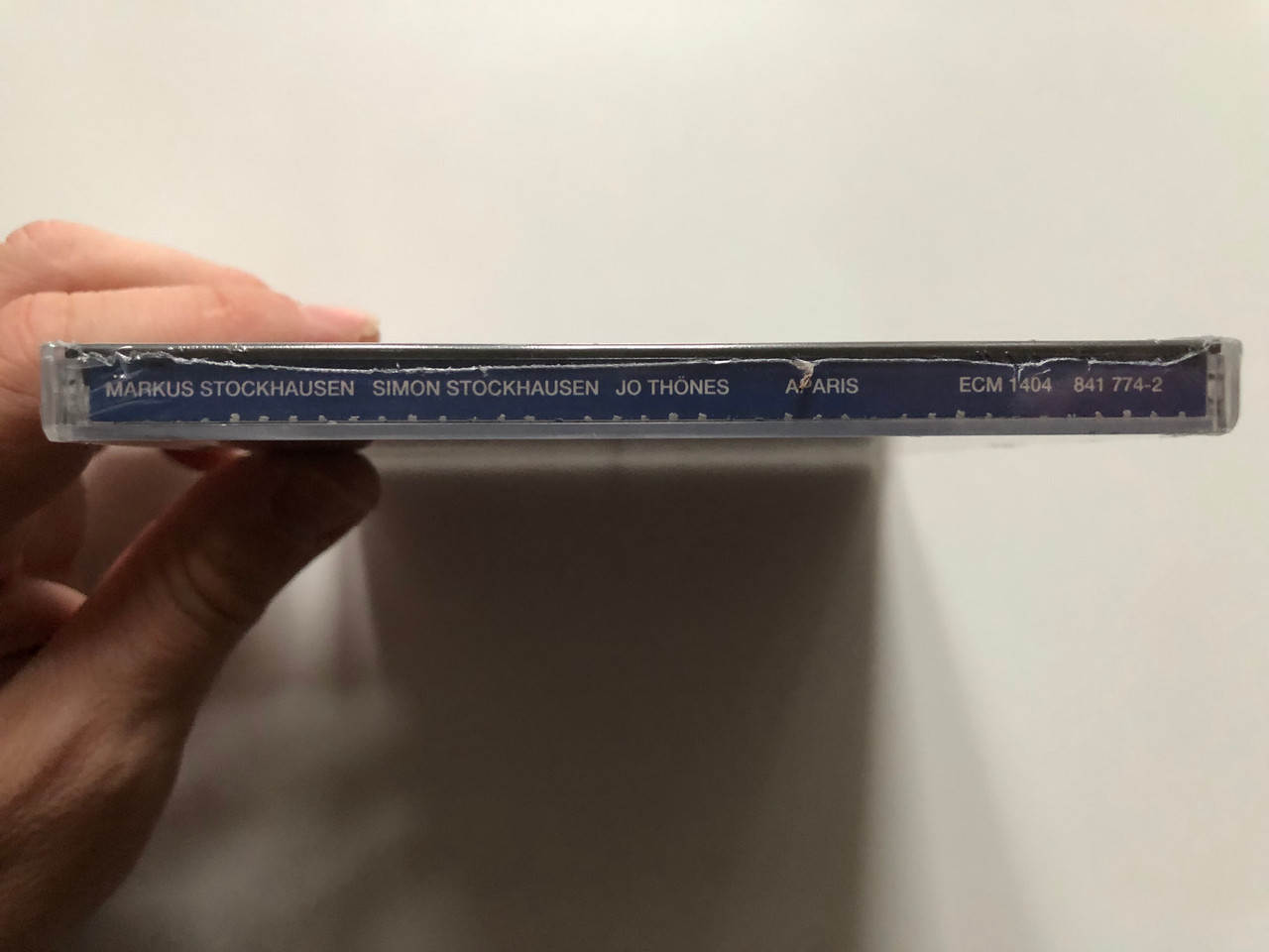 https://cdn10.bigcommerce.com/s-62bdpkt7pb/products/0/images/272582/Markus_Stockhausen_Simon_Stockhausen_Jo_Thnes_Aparis_ECM_Records_Audio_CD_1990_ECM_1404_3__59654.1681323138.1280.1280.JPG?c=2&_gl=1*1qw7nnw*_ga*MjA2NTIxMjE2MC4xNTkwNTEyNTMy*_ga_WS2VZYPC6G*MTY4MTMwODY2NS44NDUuMS4xNjgxMzIzMDMzLjUyLjAuMA..
