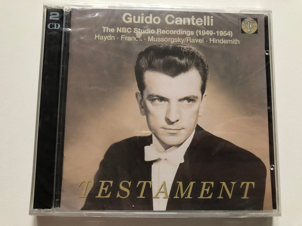 https://cdn10.bigcommerce.com/s-62bdpkt7pb/products/0/images/272586/Gudio_Cantelli_-_The_NBC_Studio_Recordings_1949-1954_-_Haydn_Franck_MussorgskyRavel_Hindemith_Testament_2x_Audio_CD_2000_Mono_Stereo_SBT_2194_1__19601.1681397691.1280.1280.JPG?c=2&_gl=1*1umco0v*_ga*MjA2NTIxMjE2MC4xNTkwNTEyNTMy*_ga_WS2VZYPC6G*MTY4MTM5NjQ3OC44NDYuMS4xNjgxMzk3MTkzLjEwLjAuMA..