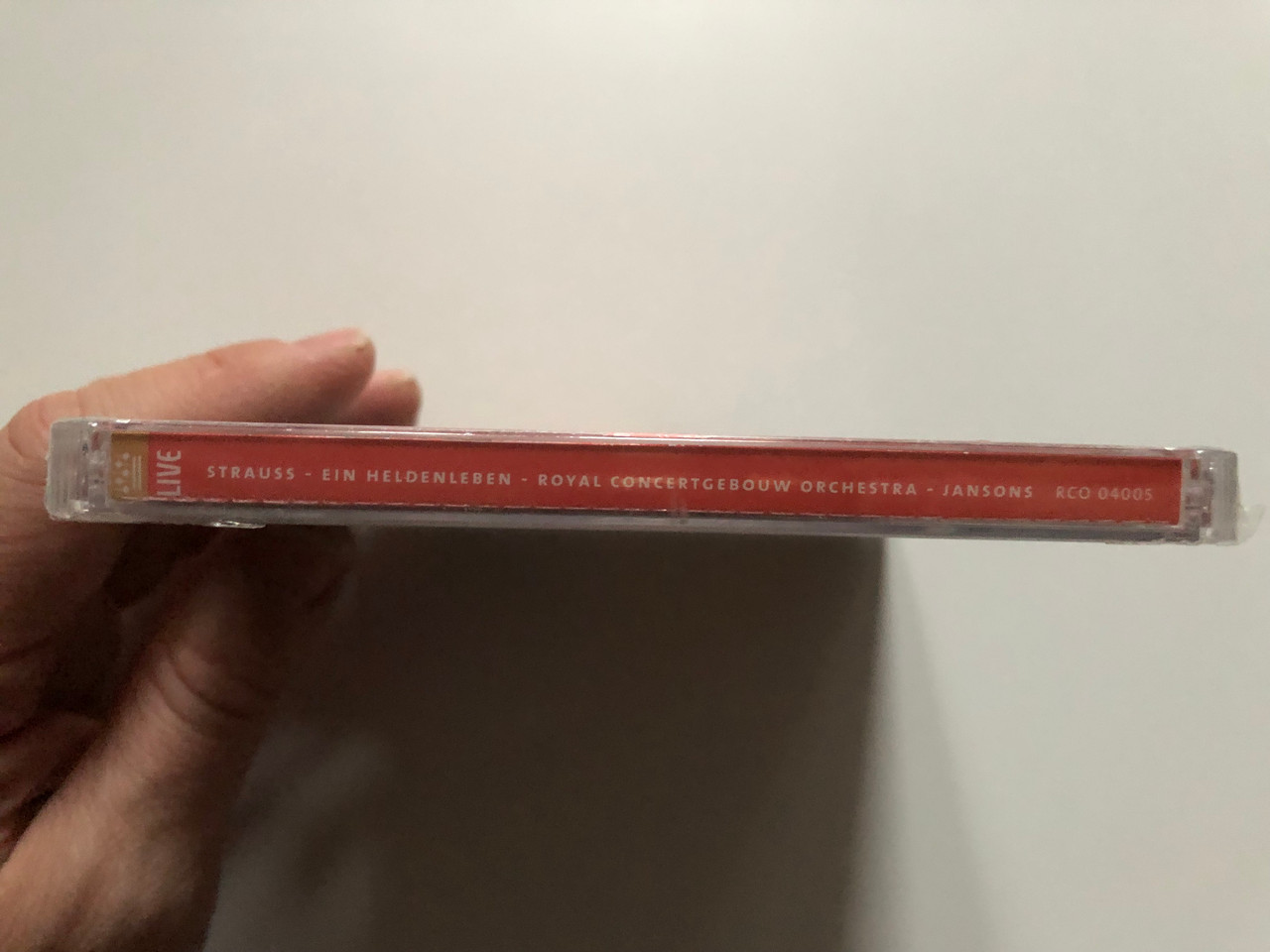 https://cdn10.bigcommerce.com/s-62bdpkt7pb/products/0/images/272707/Royal_Concertgebouw_Orchestra_-_Strauss_Ein_Heldenleben_-_Mariss_Jansons_Chief_Conductor_RCO_Live_Hybrid_Disc_Stereo_RCO_04005_3__36052.1681461641.1280.1280.JPG?c=2&_gl=1*n48n9h*_ga*MjA2NTIxMjE2MC4xNTkwNTEyNTMy*_ga_WS2VZYPC6G*MTY4MTQ1NjEwOS44NDcuMS4xNjgxNDYxMjkxLjI0LjAuMA..