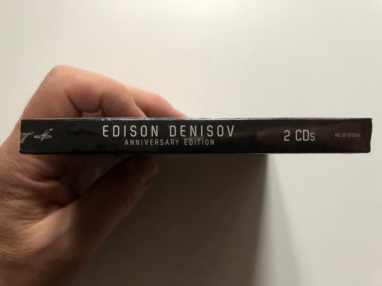 https://cdn10.bigcommerce.com/s-62bdpkt7pb/products/0/images/272732/Edison_Denisov_Anniversary_Edition_First_Time_On_CD_2x_Audio_CD_2019_MEL_CD_10_02604_3__71016.1681467868.1280.1280.JPG?c=2&_gl=1*dbv310*_ga*MjA2NTIxMjE2MC4xNTkwNTEyNTMy*_ga_WS2VZYPC6G*MTY4MTQ2NDIxMS44NDguMS4xNjgxNDY3ODkwLjYwLjAuMA..