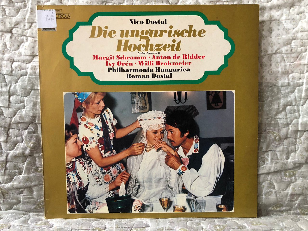 https://cdn10.bigcommerce.com/s-62bdpkt7pb/products/0/images/272938/Nico_Dostal_Die_Ungarische_Hochzeit_Grosser_Querschnitt_-_Margit_Schramm_Anton_de_Ridder_Isy_Orn_Willi_Brokmeier_Philharmonia_Hungarica_Roman_Dostal_Die_Stimme_Seines_Herrn_LP_1975_1C_061-28_828_1__64539.1681809369.1280.1280.JPG?c=2&_gl=1*1qycorj*_ga*MjA2NTIxMjE2MC4xNTkwNTEyNTMy*_ga_WS2VZYPC6G*MTY4MTgwNjM1My44NTMuMS4xNjgxODA5MjA2LjM0LjAuMA..