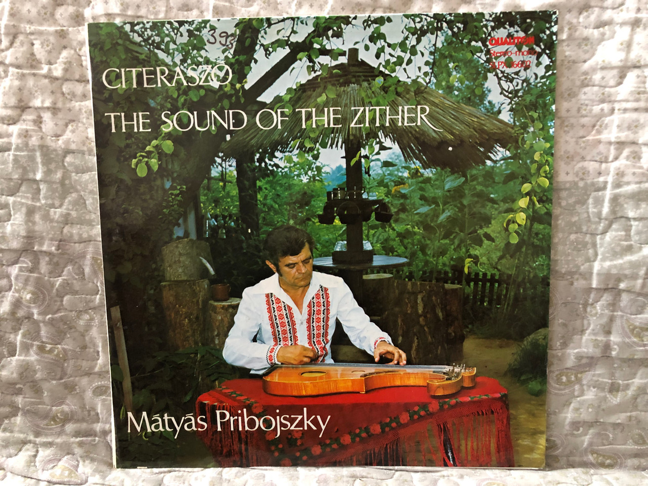 https://cdn10.bigcommerce.com/s-62bdpkt7pb/products/0/images/274335/Citerasz_The_Sound_Of_The_Zither_-_Mtys_Pribojszky_Qualiton_LP_Stereo_1978_SLPX_16602_1__06608.1683649034.1280.1280.JPG?c=2&_gl=1*27zacd*_ga*MjA2NTIxMjE2MC4xNTkwNTEyNTMy*_ga_WS2VZYPC6G*MTY4MzY0NTczMi44ODQuMS4xNjgzNjQ4OTkyLjYwLjAuMA..