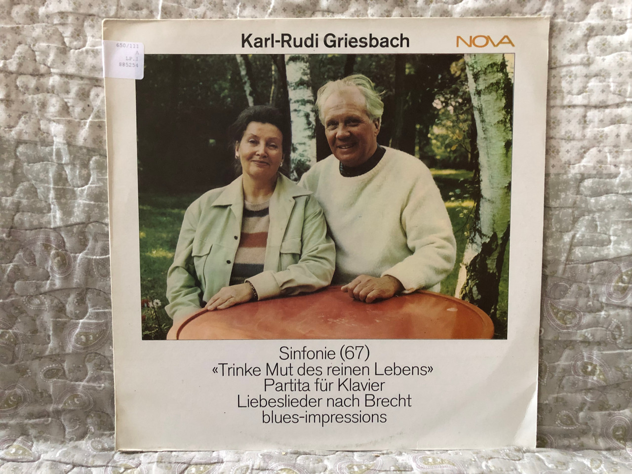 https://cdn10.bigcommerce.com/s-62bdpkt7pb/products/0/images/274526/Karl-Rudi_Griesbach_Sinfonie_67_Trinke_Mut_Des_Reinen_Lebens_Partita_Fr_Klavier_Liebeslieder_Nach_Brecht_Blues-Impressions_NOVA_LP_Stereo_1986_885254__20744.1683884078.1280.1280.JPG?c=2&_gl=1*1516zu0*_ga*MjA2NTIxMjE2MC4xNTkwNTEyNTMy*_ga_WS2VZYPC6G*MTY4Mzg4MjI4Ny44OTEuMS4xNjgzODgzODk3LjI5LjAuMA..