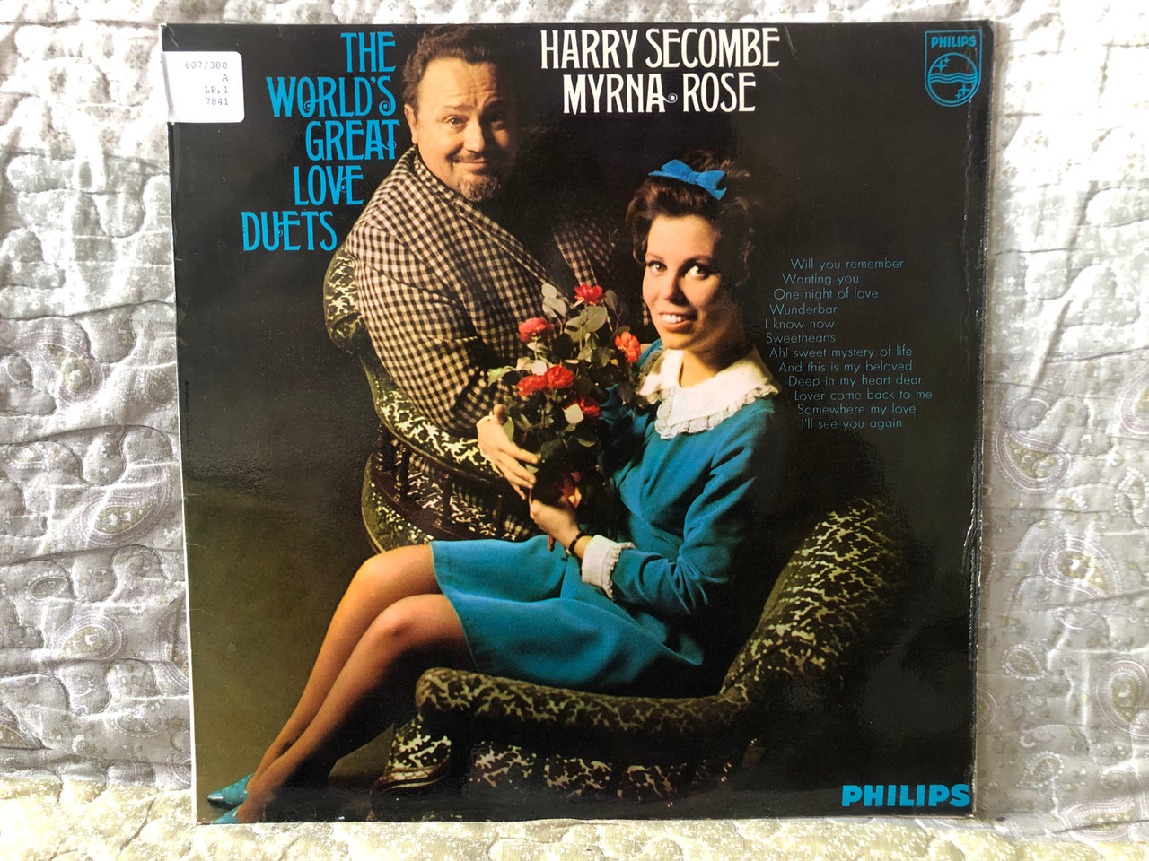 https://cdn10.bigcommerce.com/s-62bdpkt7pb/products/0/images/274965/Harry_Secombe_Myrna_Rose_The_Worlds_Greatest_Love_Duets_Will_you_Remember_Wanting_You_One_Night_Of_Love_Wunderbar_I_Know_Now_Sweethearts_Ah_Sweet_Mystery_Of_Life_And_This_Is_My_Beloved_Phili_1__38580.1684399288.1280.1280.JPG?c=2&_gl=1*phj91t*_ga*MjA2NTIxMjE2MC4xNTkwNTEyNTMy*_ga_WS2VZYPC6G*MTY4NDM4ODk3My45MDAuMS4xNjg0Mzk5MDU1LjU3LjAuMA..