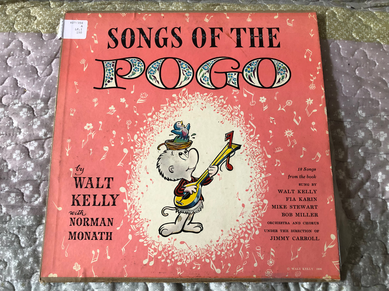 https://cdn10.bigcommerce.com/s-62bdpkt7pb/products/0/images/275016/Songs_Of_The_Pogo_-_by_Walt_Kelly_With_Norman_Monath_18_Songs_from_the_book_Sung_by_Walt_Kelly_Fia_Karin_Mike_Stewart_Bob_Miller_Orchestra_And_Chorus_under_the_direction_of_Jimmy_Carroll_Simon_Sch_1__17762.1684482695.1280.1280.JPG?c=2&_gl=1*if05e*_ga*MjA2NTIxMjE2MC4xNTkwNTEyNTMy*_ga_WS2VZYPC6G*MTY4NDQ3ODM2Ny45MDMuMS4xNjg0NDgyMzMxLjU5LjAuMA..