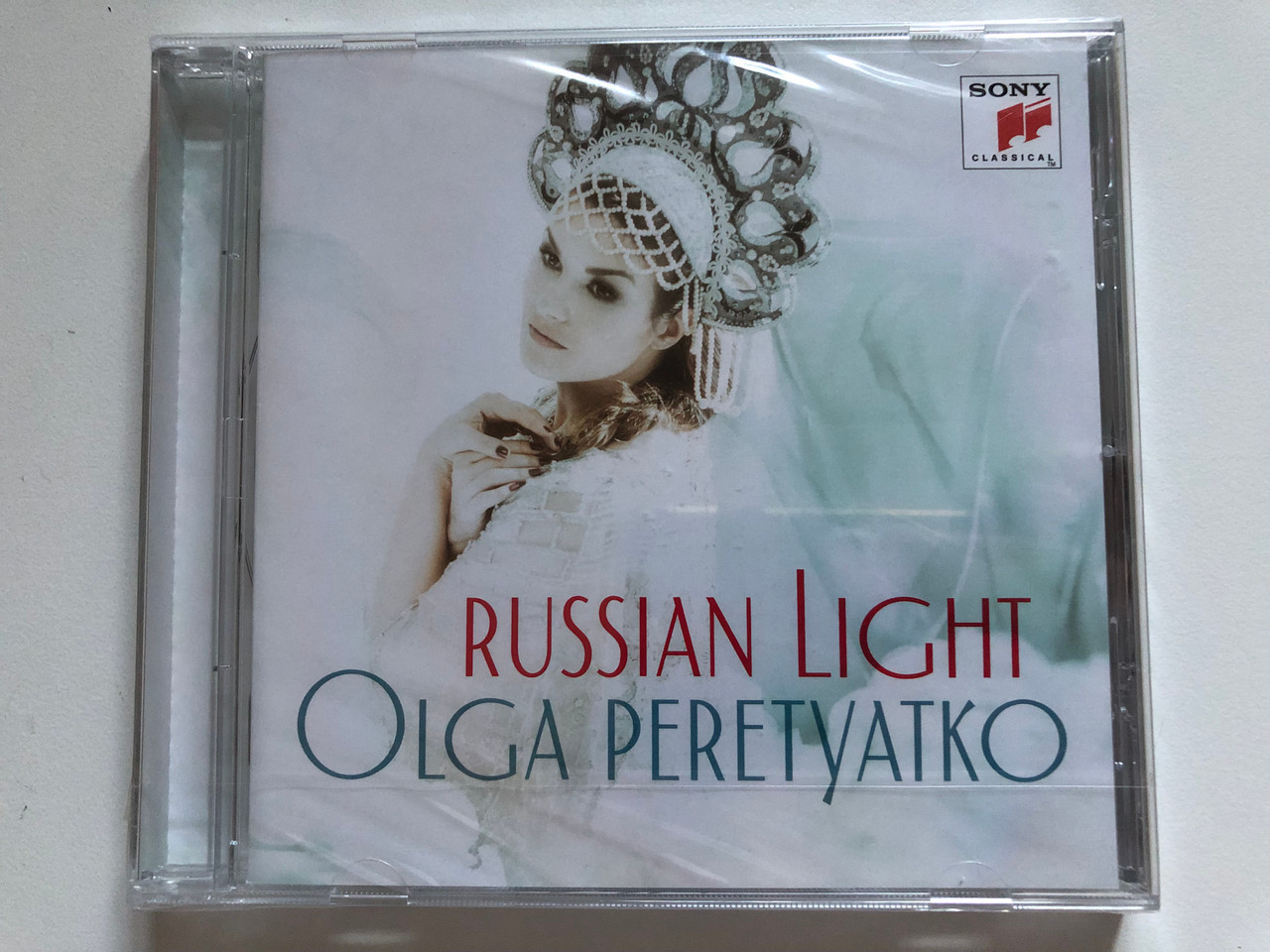 https://cdn10.bigcommerce.com/s-62bdpkt7pb/products/0/images/275223/Olga_Peretyatko_Russian_Light_Sony_Classical_Audio_CD_2017_88985352232_1__36316.1684838784.1280.1280.JPG?c=2&_gl=1*1vuil2*_ga*MjA2NTIxMjE2MC4xNTkwNTEyNTMy*_ga_WS2VZYPC6G*MTY4NDgzMDY5Ni45MDcuMS4xNjg0ODM4NzgzLjYwLjAuMA..