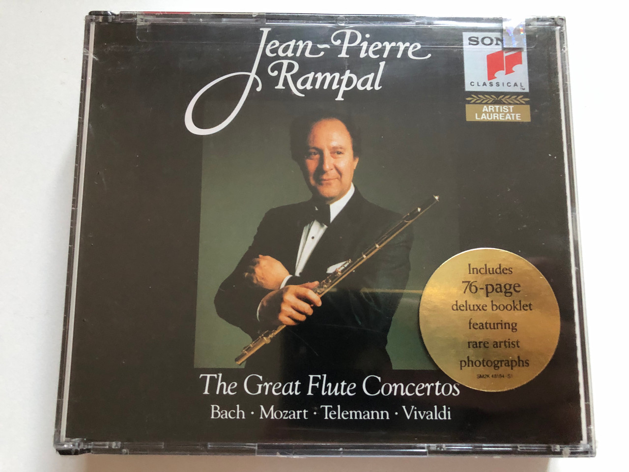 https://cdn10.bigcommerce.com/s-62bdpkt7pb/products/0/images/275241/Jean-Pierre_Rampal_The_Great_Flute_Concertos_Bach_Mozart_Telemann_Vivaldi_Artist_Laureate_Sony_Classical_2x_Audio_CD_1992_SM2K_48184_1__48560.1684844121.1280.1280.JPG?c=2&_gl=1*14duj7q*_ga*MjA2NTIxMjE2MC4xNTkwNTEyNTMy*_ga_WS2VZYPC6G*MTY4NDg0MTk5MC45MDguMS4xNjg0ODQ0MDE1LjQ4LjAuMA..