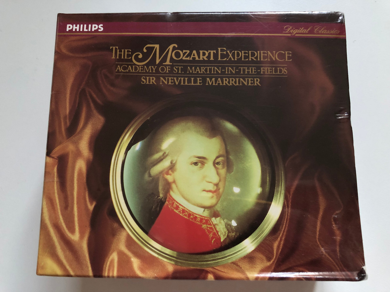 https://cdn10.bigcommerce.com/s-62bdpkt7pb/products/0/images/275274/The_Mozart_Experience_-_Academy_Of_St._Martin-in-the-Fields_Sir_Neville_Marriner_Philips_Digital_Classics_Philips_5x_Audio_CD_Box_Set_1989_Stereo_426_204-2_1__36388.1684912577.1280.1280.JPG?c=2&_gl=1*3ae2jz*_ga*MjA2NTIxMjE2MC4xNTkwNTEyNTMy*_ga_WS2VZYPC6G*MTY4NDkwNTUzNi45MDkuMS4xNjg0OTEyMDQ4LjQ0LjAuMA..