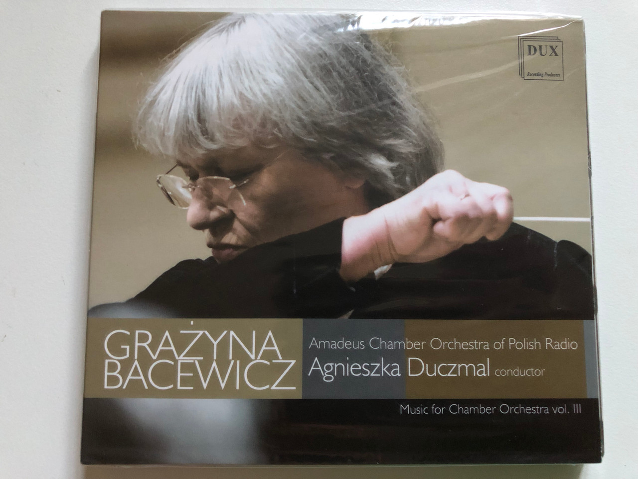 https://cdn10.bigcommerce.com/s-62bdpkt7pb/products/0/images/275281/Grazyna_Bacewicz_Music_For_Chamber_Orchestra_Vol._III_-_Amadeus_Chamber_Orchestra_of_Polish_Radio_Agnieszka_Duczmal_conductor_DUX_Recording_Audio_CD_2021_DUX_1828_1__63800.1684913307.1280.1280.JPG?c=2&_gl=1*3mp03o*_ga*MjA2NTIxMjE2MC4xNTkwNTEyNTMy*_ga_WS2VZYPC6G*MTY4NDkwNTUzNi45MDkuMS4xNjg0OTEzMjcxLjUxLjAuMA..