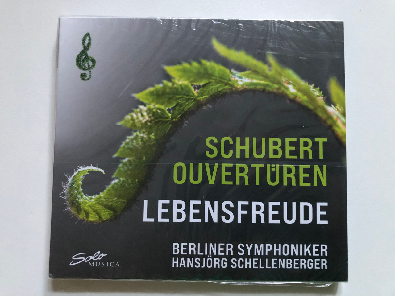 https://cdn10.bigcommerce.com/s-62bdpkt7pb/products/0/images/275287/Schubert_Ouverturen_-_Lebensfreude_-_Berliner_Symphoniker_Hansjorg_Schellenberger_Solo_Musica_Audio_CD_2022_SM_361_1__69643.1684914674.1280.1280.JPG?c=2&_gl=1*mcg52p*_ga*MjA2NTIxMjE2MC4xNTkwNTEyNTMy*_ga_WS2VZYPC6G*MTY4NDkwNTUzNi45MDkuMS4xNjg0OTE0NDg5LjUzLjAuMA..