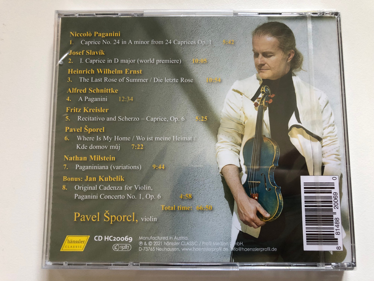 https://cdn10.bigcommerce.com/s-62bdpkt7pb/products/0/images/275318/Pavel_porcl_Paganiniana_-_Works_for_violin_by_Paganini_Slavik_Ernst_Schnittke_Kreisler_porcl_Milstein_Kubelik_hanssler_classic_Audio_CD_2021_CD_HC20069_2__66437.1684920742.1280.1280.JPG?c=2&_gl=1*smztth*_ga*MjA2NTIxMjE2MC4xNTkwNTEyNTMy*_ga_WS2VZYPC6G*MTY4NDkwNTUzNi45MDkuMS4xNjg0OTIwNTk3LjUzLjAuMA..