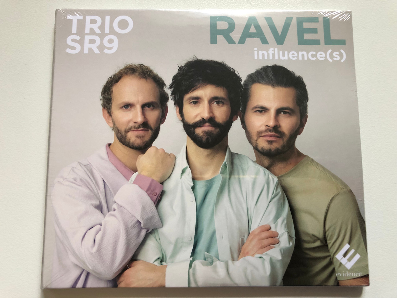 https://cdn10.bigcommerce.com/s-62bdpkt7pb/products/0/images/275416/Trio_SR9_-_Ravel_influences_evidence_Audio_CD_2022_EVCD086_1__49299.1685110915.1280.1280.JPG?c=2&_gl=1*q6ijsf*_ga*MjA2NTIxMjE2MC4xNTkwNTEyNTMy*_ga_WS2VZYPC6G*MTY4NTEwNjUzMy45MTIuMS4xNjg1MTEwODAxLjQ4LjAuMA..