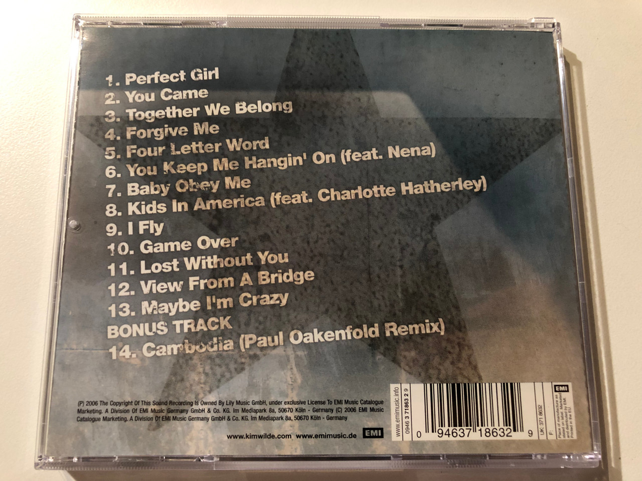 https://cdn10.bigcommerce.com/s-62bdpkt7pb/products/0/images/275453/Kim_Wilde_Never_Say_Never_EMI_Audio_CD_2006_00946_3_71863_2_9_2__58384.1685116184.1280.1280.JPG?c=2&_gl=1*1s7bmyg*_ga*MjA2NTIxMjE2MC4xNTkwNTEyNTMy*_ga_WS2VZYPC6G*MTY4NTEwNjUzMy45MTIuMS4xNjg1MTE2MTY4LjYwLjAuMA..