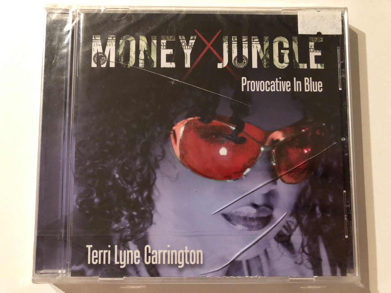 https://cdn10.bigcommerce.com/s-62bdpkt7pb/products/0/images/275729/Money_Jungle_Provocative_In_Blue_-_Terri_Lyne_Carrington_Concord_Jazz_Audio_CD_2013_CJA-34026-02_1__05173.1685513878.1280.1280.JPG?c=2&_gl=1*q0qoi3*_ga*MjA2NTIxMjE2MC4xNTkwNTEyNTMy*_ga_WS2VZYPC6G*MTY4NTUxMjMwNC45MjAuMS4xNjg1NTEzNjQ3LjU3LjAuMA..