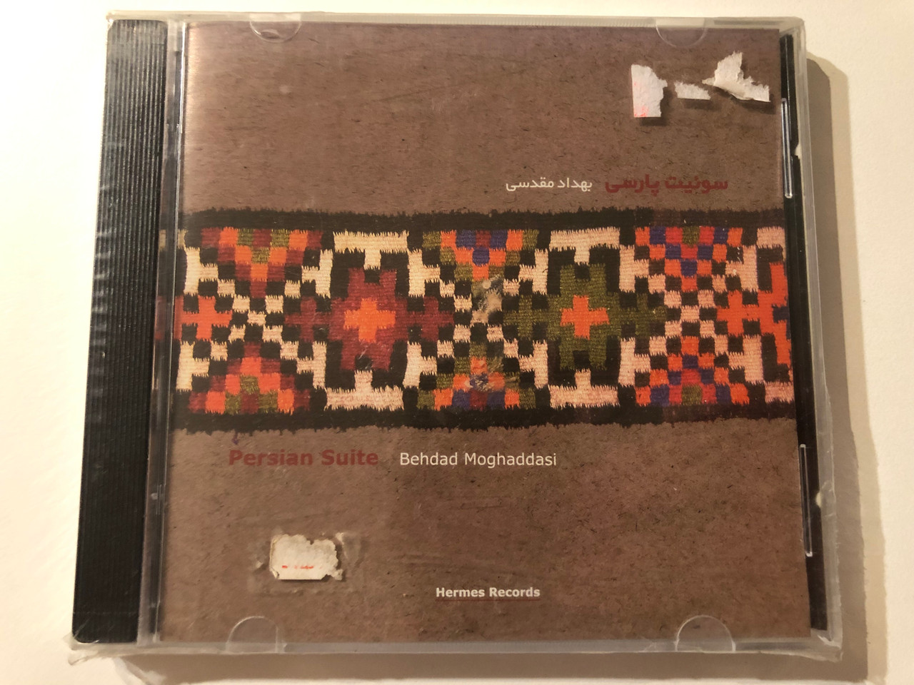 https://cdn10.bigcommerce.com/s-62bdpkt7pb/products/0/images/275948/Behdad_Moghaddasi_Persian_Suite_Hermes_Records_Audio_CD_2010_HER-052_1__55360.1685981561.1280.1280.JPG?c=2&_gl=1*1m209re*_ga*MjA2NTIxMjE2MC4xNTkwNTEyNTMy*_ga_WS2VZYPC6G*MTY4NTk4MTQzMi45MjguMS4xNjg1OTgxNTg3LjYwLjAuMA..