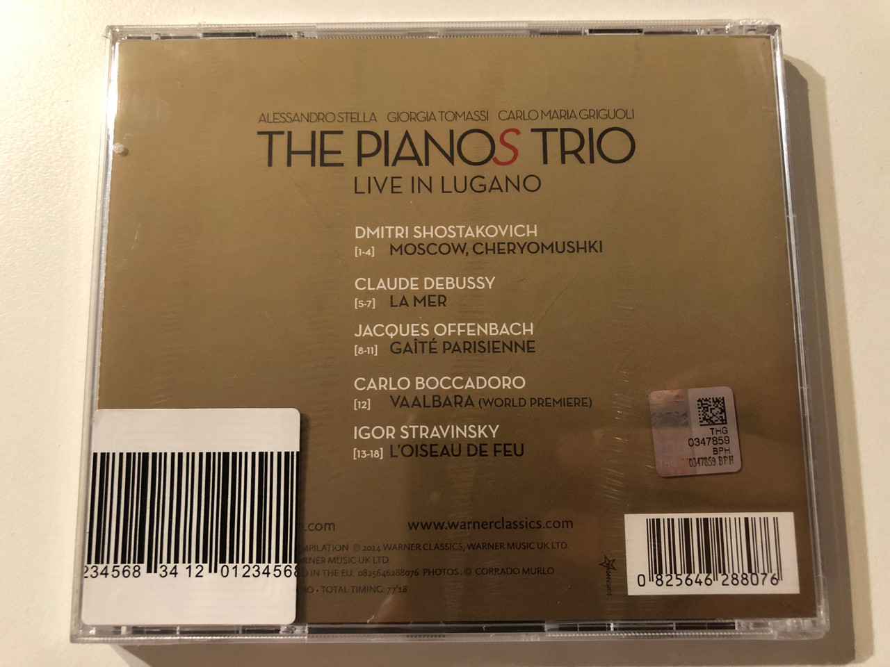https://cdn10.bigcommerce.com/s-62bdpkt7pb/products/0/images/275964/The_Pianos_Trio_Alessandro_Stella_Giorgia_Tomassi_Carlo_Maria_Griguoli_-_Live_In_Lugano_-_Shostakovich_Debussy_Offenbach_Boccadoro_Stravinsky_Warner_Classics_Audio_CD_2014_082564628__94013.1685984155.1280.1280.JPG?c=2&_gl=1*7ef75f*_ga*MjA2NTIxMjE2MC4xNTkwNTEyNTMy*_ga_WS2VZYPC6G*MTY4NTk4MTQzMi45MjguMS4xNjg1OTgzODI2LjU3LjAuMA..