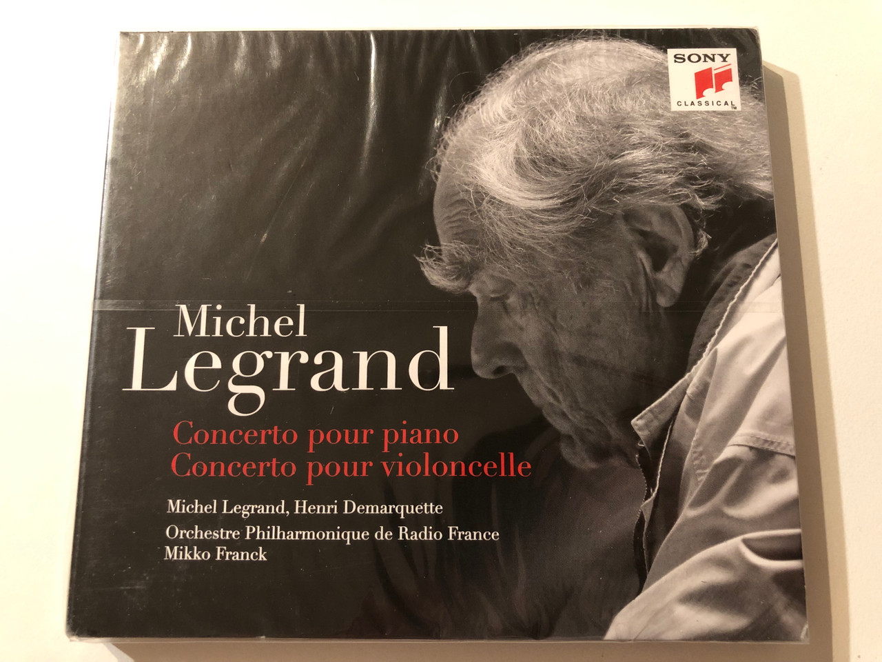 https://cdn10.bigcommerce.com/s-62bdpkt7pb/products/0/images/276061/Michel_Legrand_Concerto_Pour_Piano_Concerto_Pour_Violoncelle_-_Michel_Legrand_Henri_Demarquette_Orchestre_Philharmonique_De_Radio_France_Mikko_Franck_Sony_Classical_Audio_CD_2017_8898_1__19713.1686072909.1280.1280.JPG?c=2&_gl=1*1vjmiie*_ga*MjA2NTIxMjE2MC4xNTkwNTEyNTMy*_ga_WS2VZYPC6G*MTY4NjA3MTQ4Ni45MzAuMS4xNjg2MDcyMzg4LjUzLjAuMA..