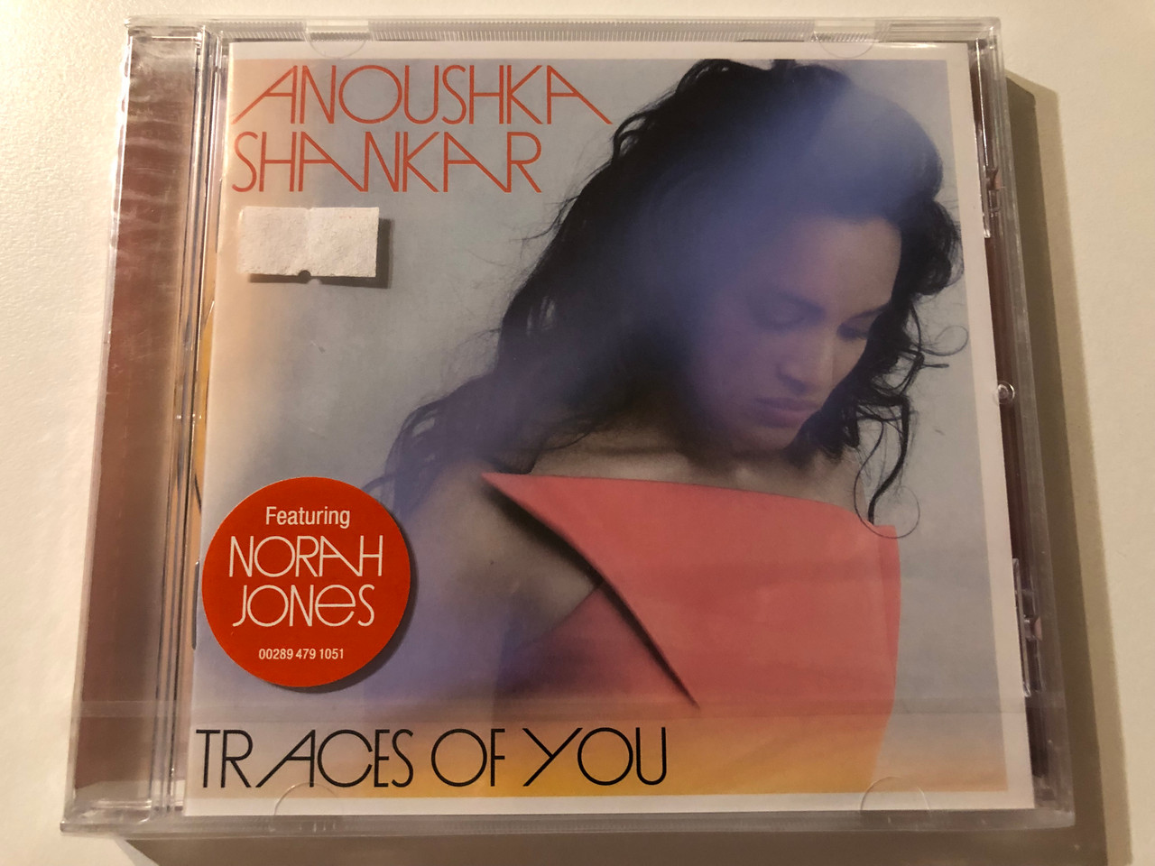 https://cdn10.bigcommerce.com/s-62bdpkt7pb/products/0/images/276116/Anoushka_Shankar_Traces_Of_You_Featuring_Norah_Jones_Deutsche_Grammophon_Audio_CD_2013_00289_479_1051_1__72828.1686153951.1280.1280.JPG?c=2&_gl=1*8z4s39*_ga*MjA2NTIxMjE2MC4xNTkwNTEyNTMy*_ga_WS2VZYPC6G*MTY4NjE0NjEyNC45MzEuMS4xNjg2MTUzODQ5LjYwLjAuMA..